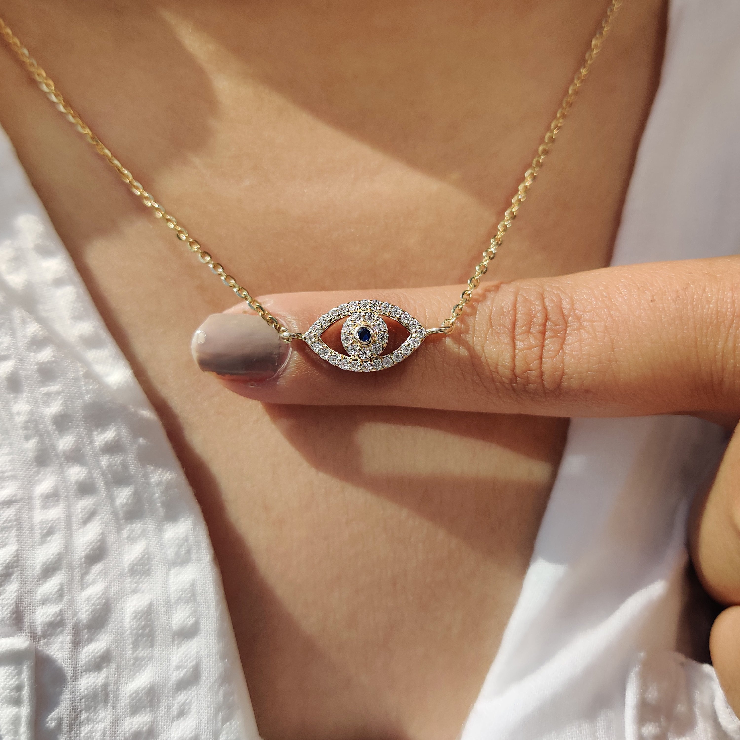 Lab-grown diamond pendant with a handmade setting for a modern touch.