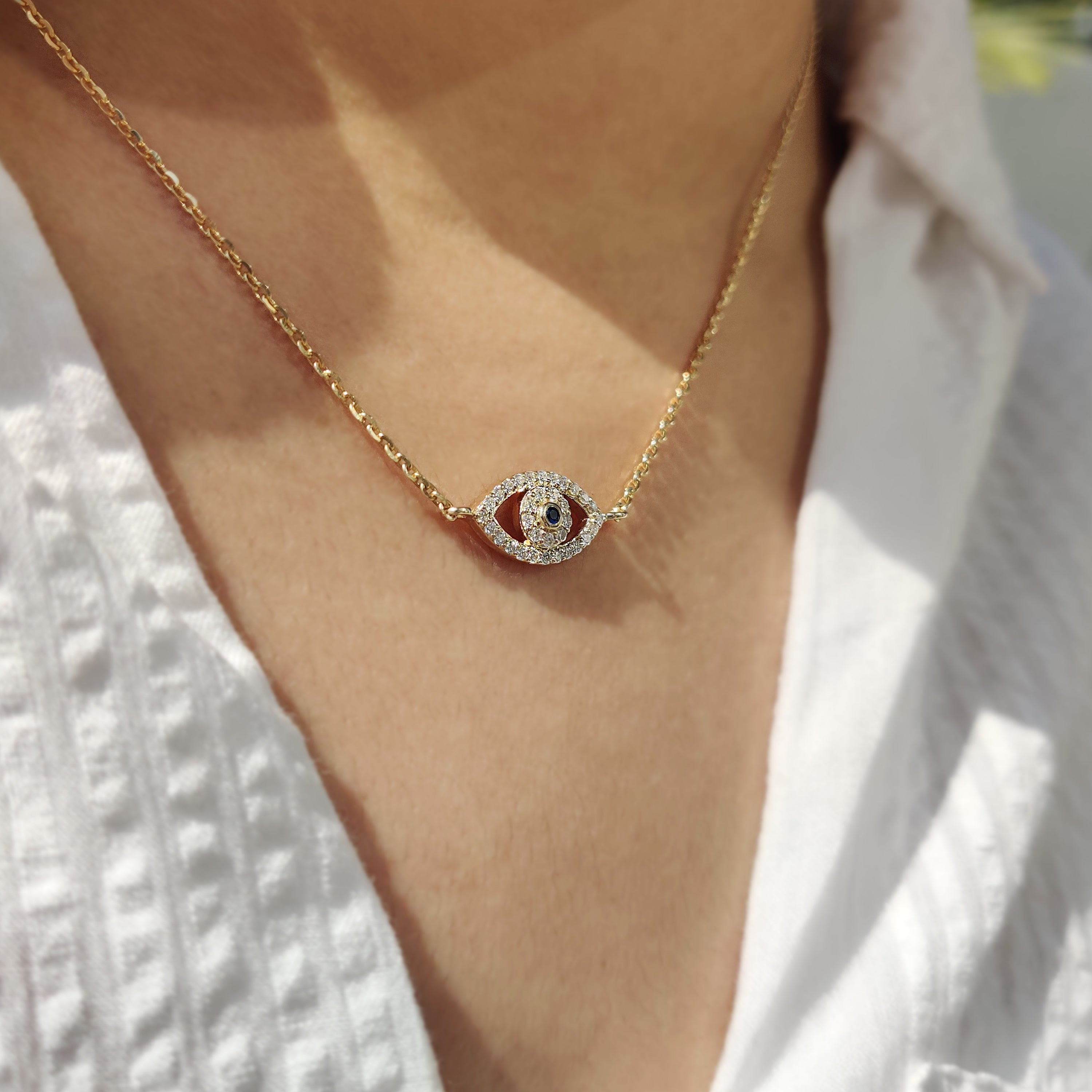Handmade jewelry featuring a unique diamond pendant from Carat Diamonds.