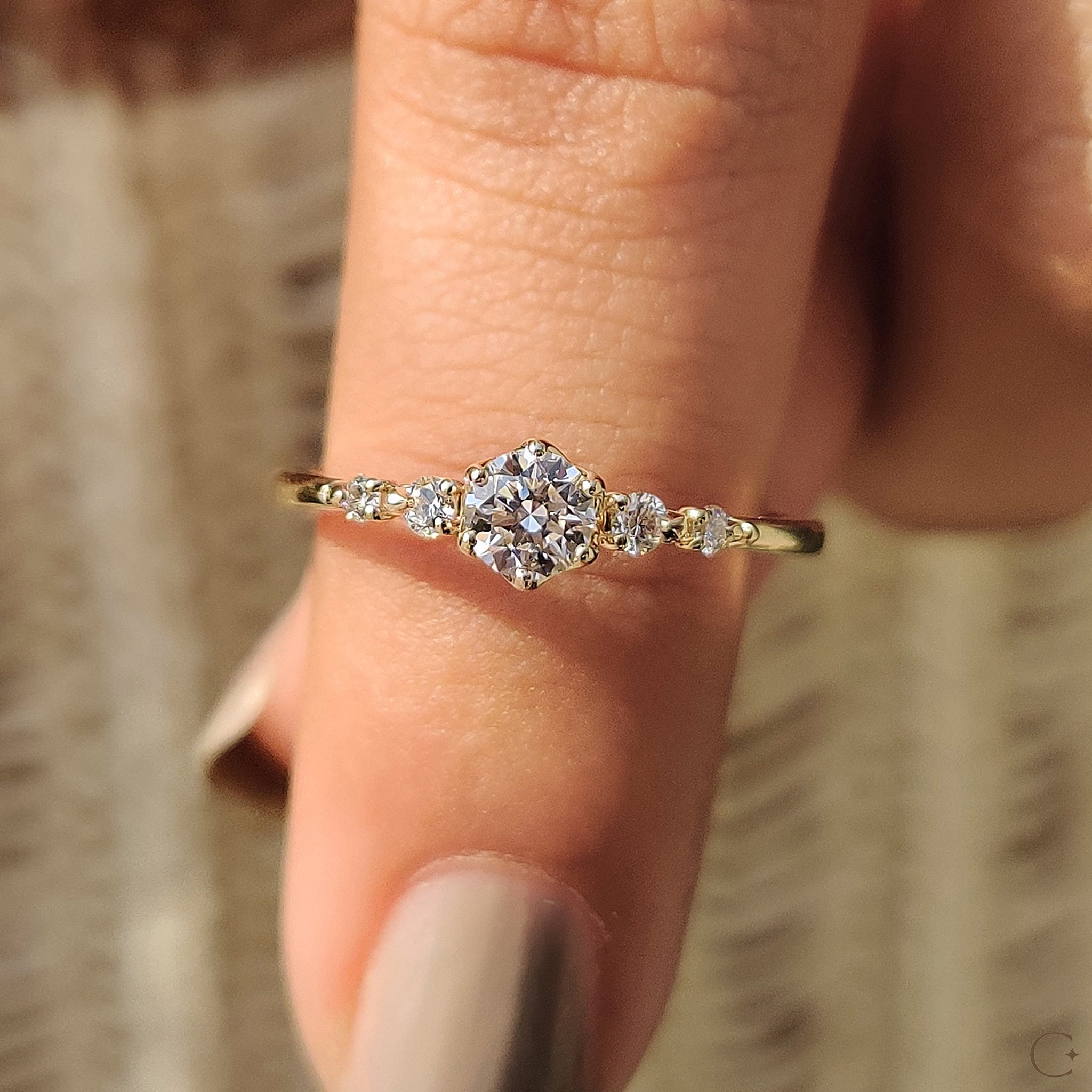 6 prong ring securely holding brilliant diamonds.
