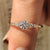 6 prong ring securely holding brilliant diamonds.
