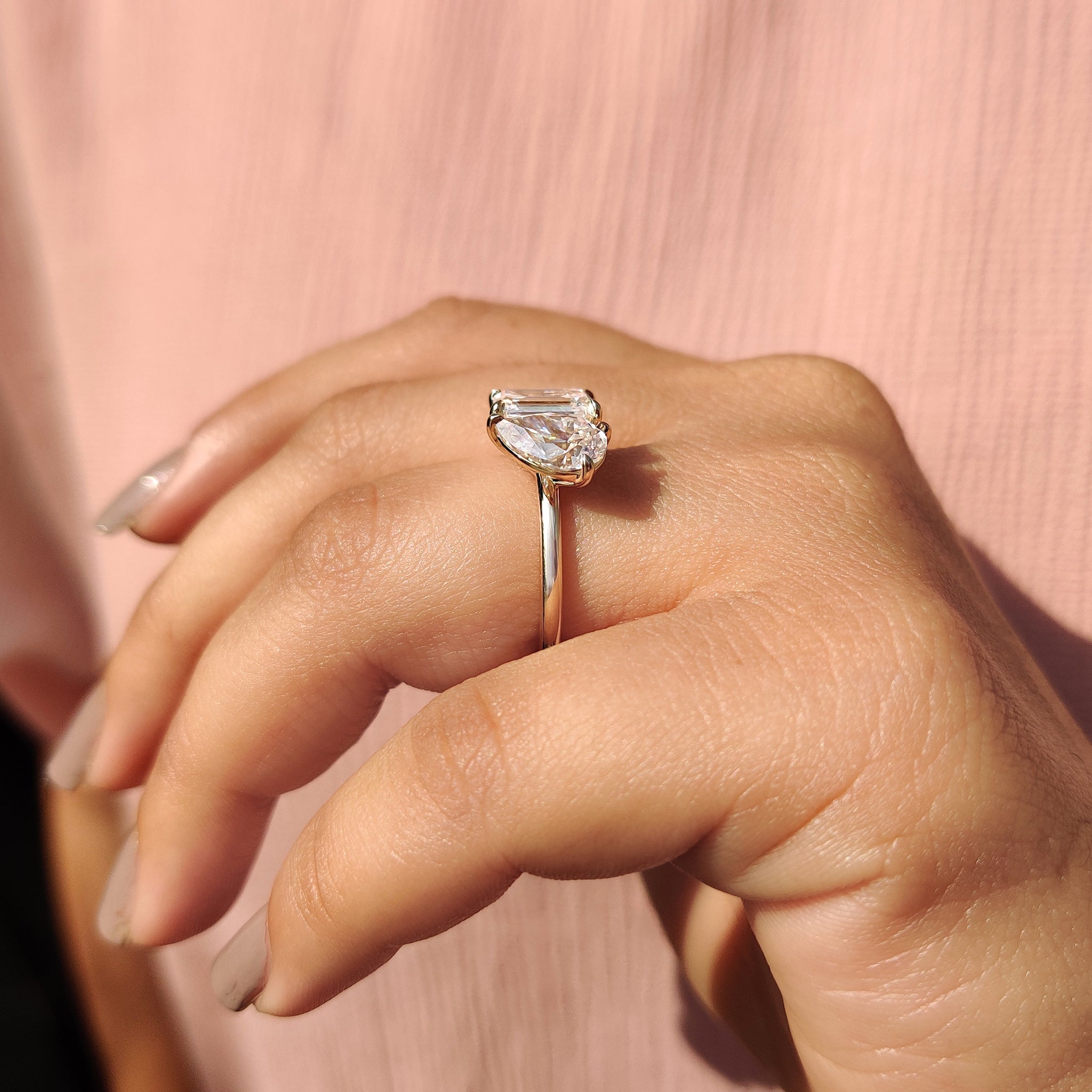 Pear and emerald cut ring blends two shapes for a unique mix.
