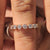 Bezel set wedding band with a sleek modern finish.
