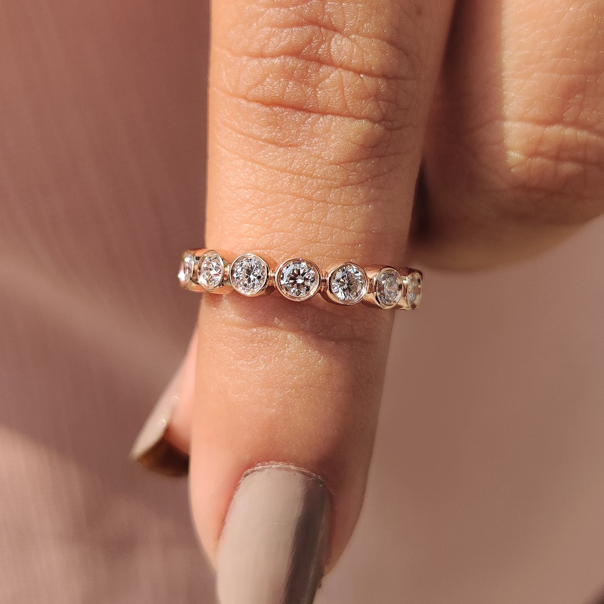 Gold Eternity Band – Round Cut Bezel Setting