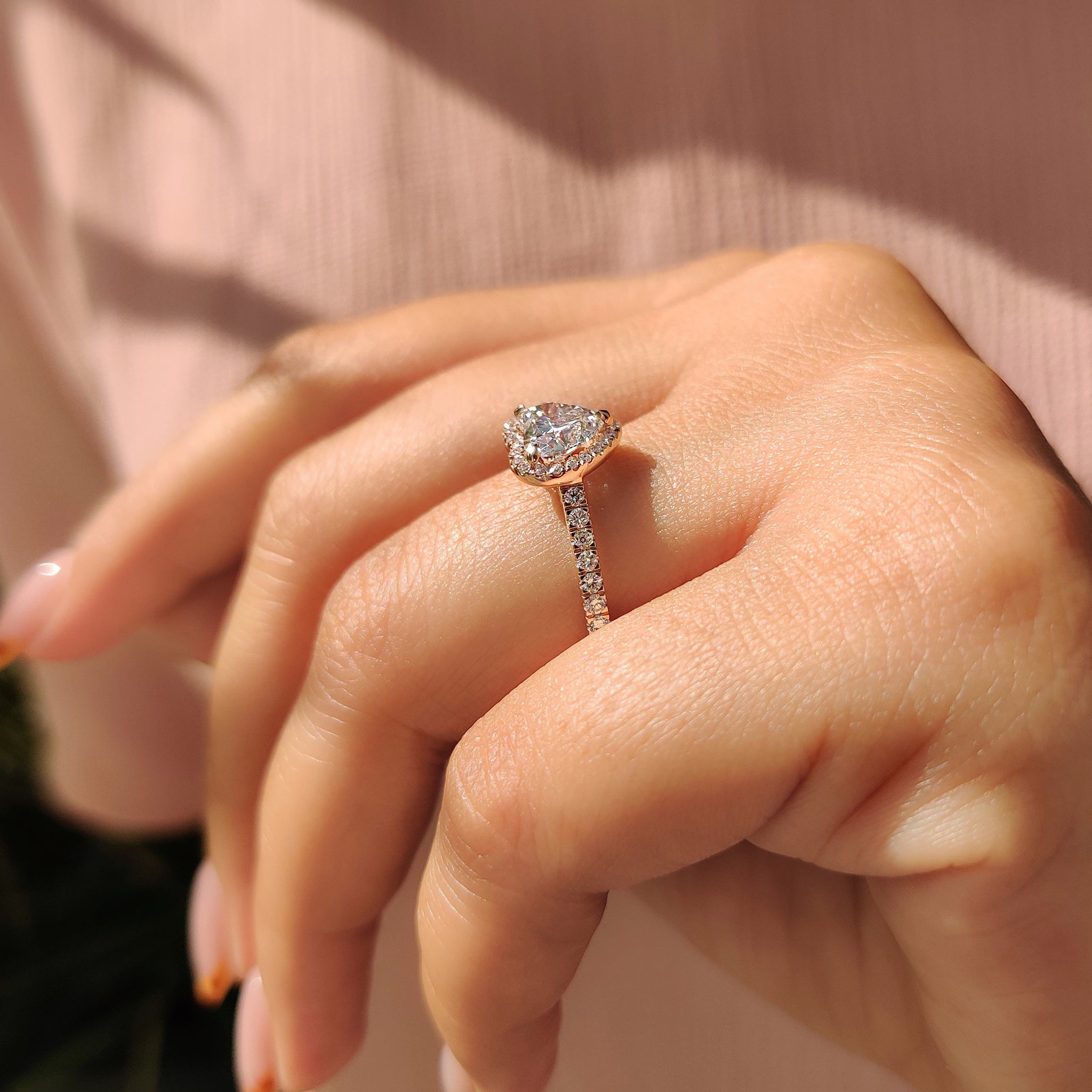 The heart shaped diamond ring offers a stunning symbol of love.