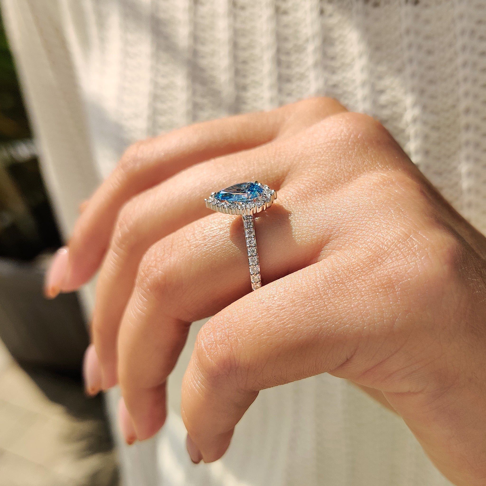 The halo ring setting enhances the diamond with a circle of tiny stones.
