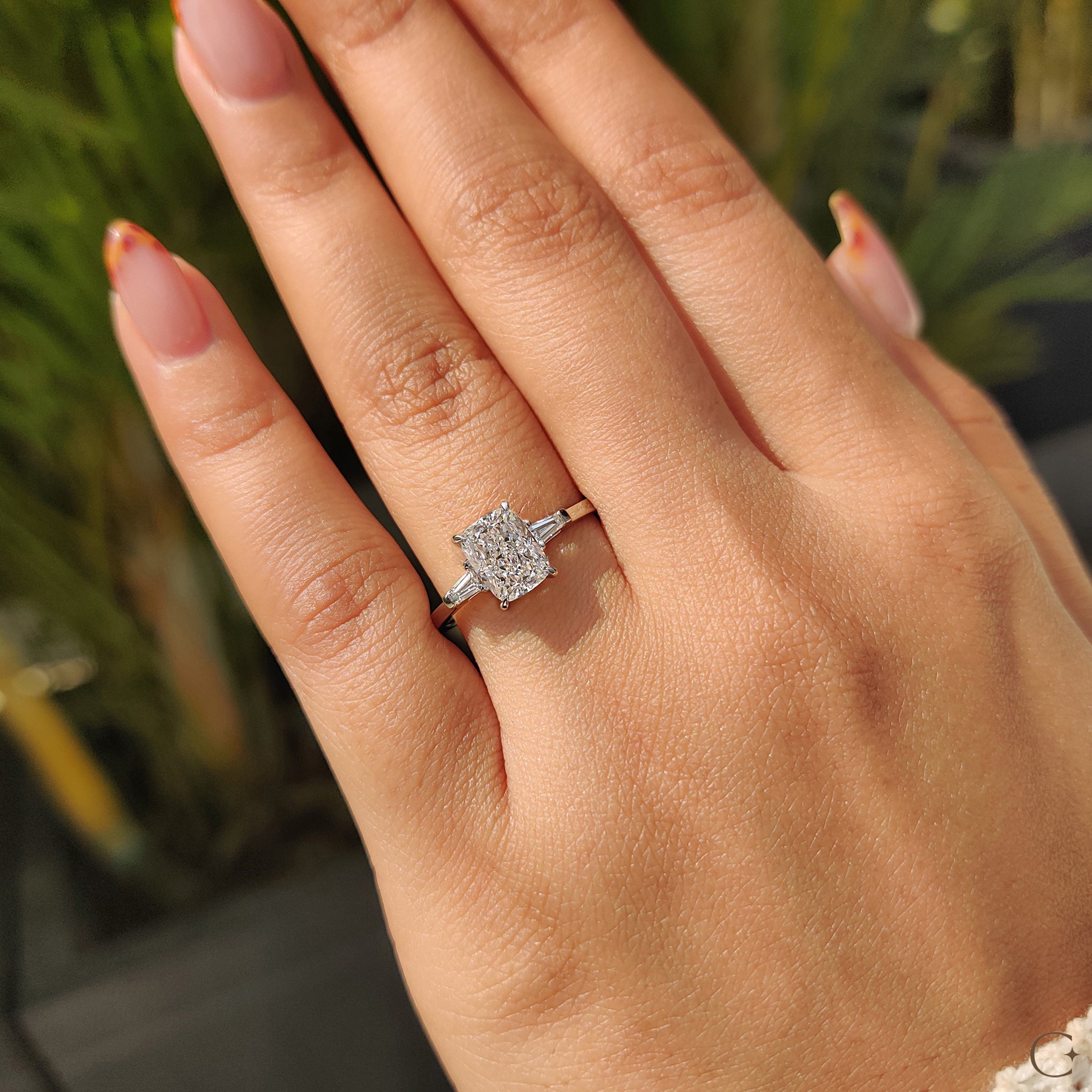The bar setting ring holds diamonds securely with a sleek look.
