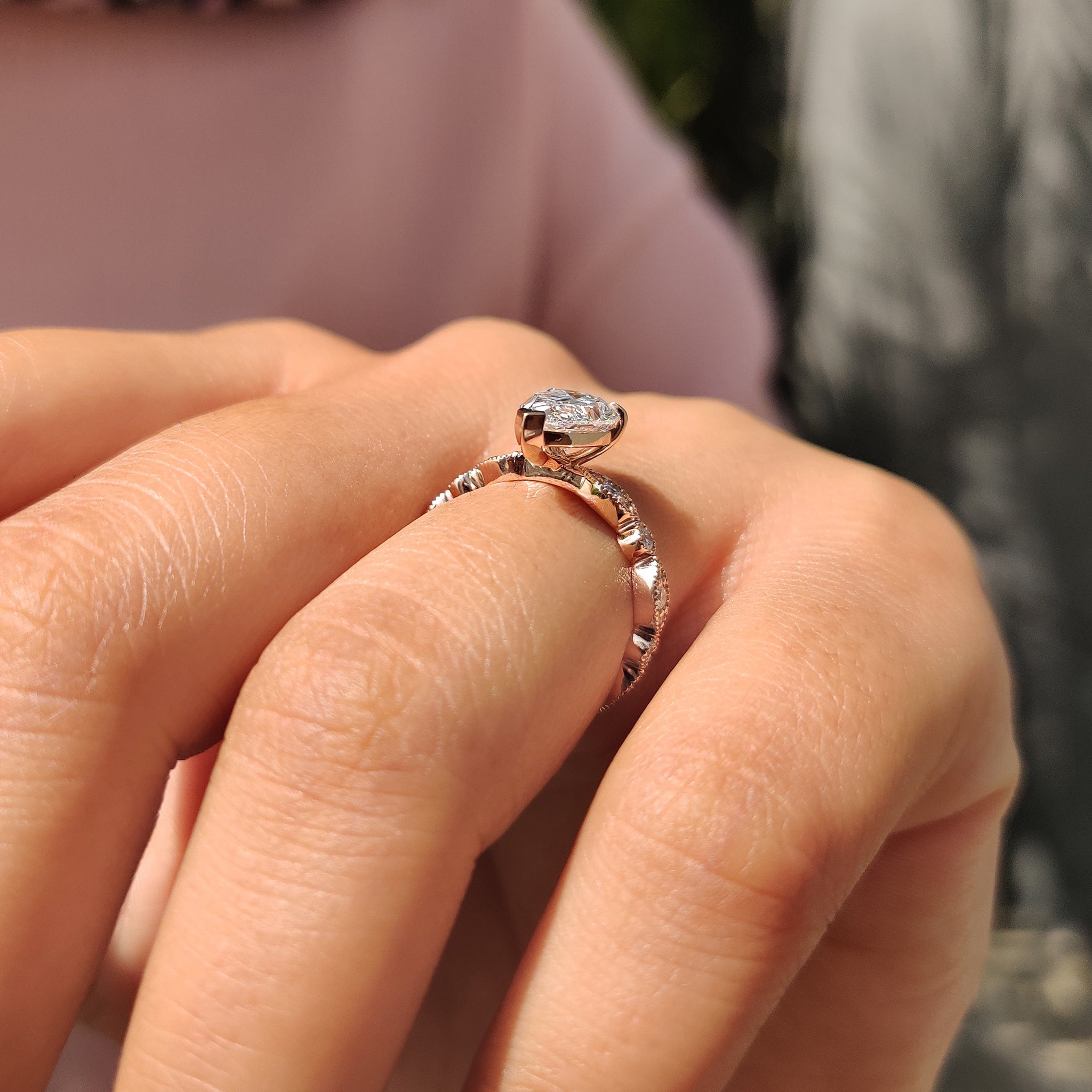 Claw prong engagement ring holds the diamond securely with style.
