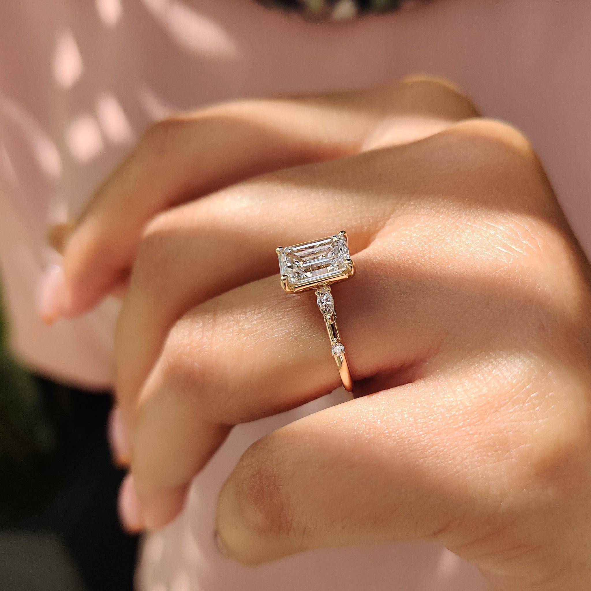 Handmade ring featuring a stone emerald cut diamond ring with carat diamonds set in a classic four prong ring design.
