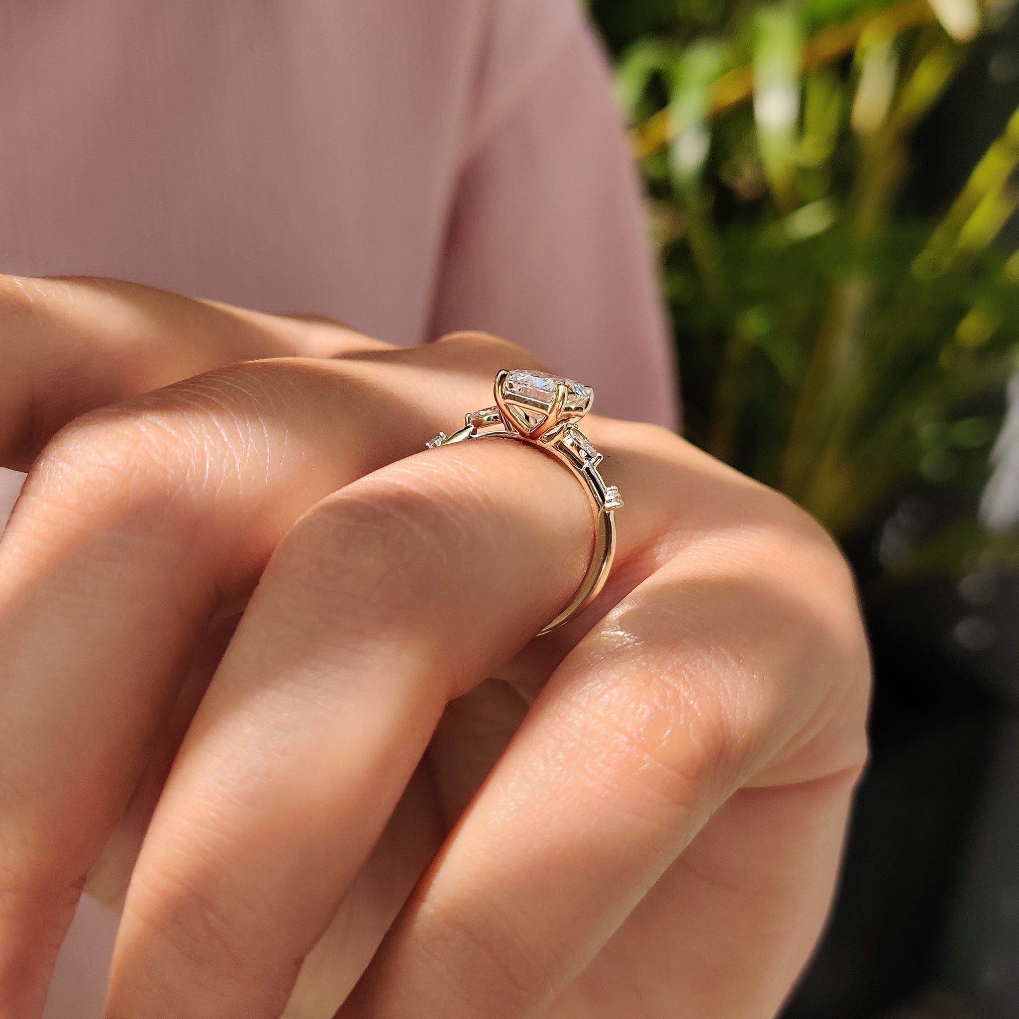 Stunning carat diamonds ring with an emerald cut diamond, featuring a distance pave setting ring and a handmade yellow gold setting.
