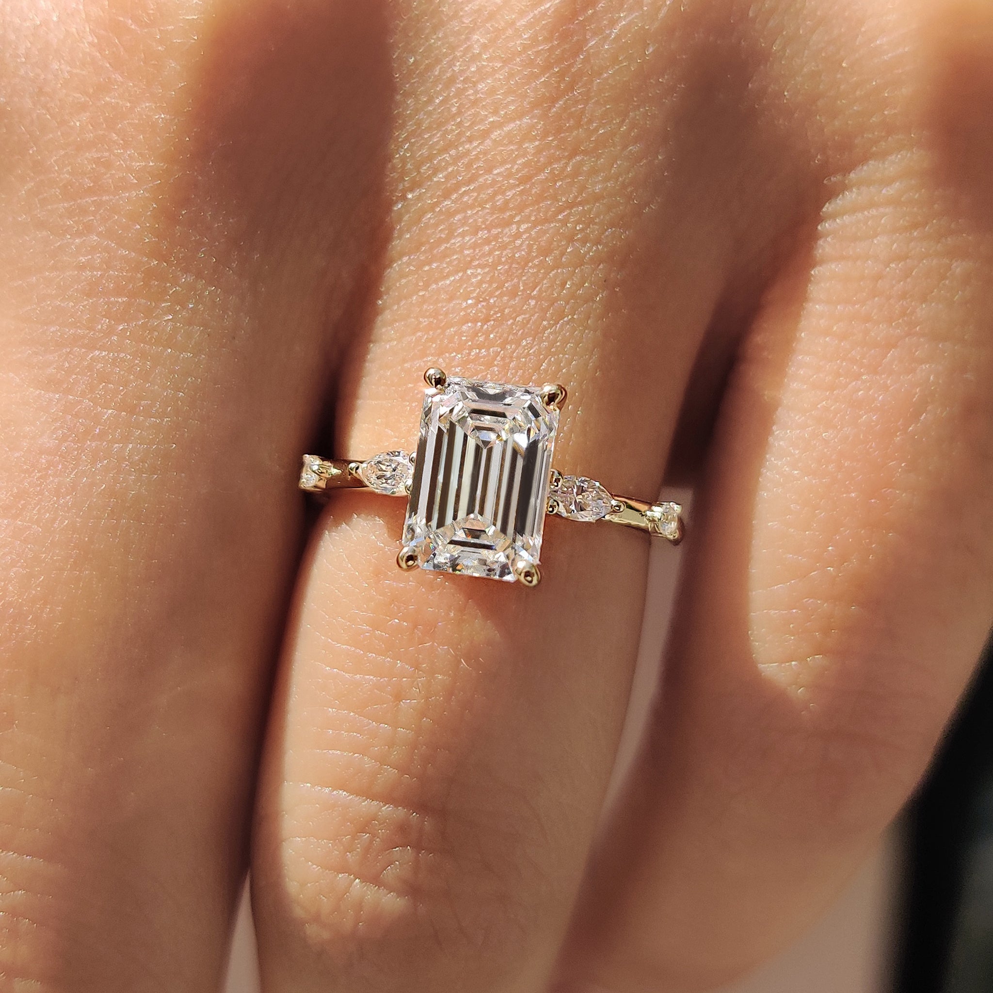 IGI certified carat diamonds engagement ring in yellow gold, designed with a four prong ring setting and featuring a distance pave design.
