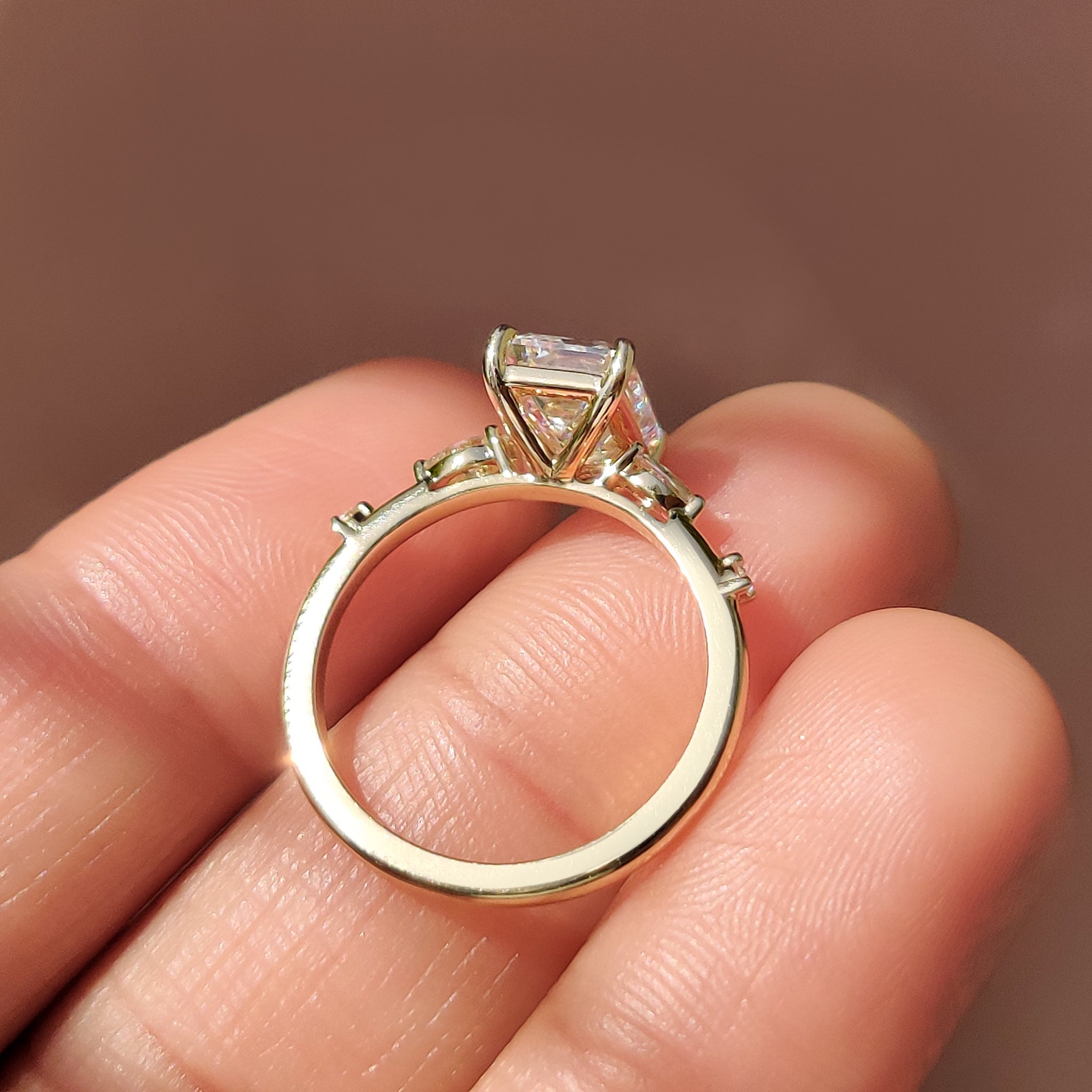 A luxurious four prong ring setting showcasing carat diamonds engagement ring with a marquise and round cut ring design.
