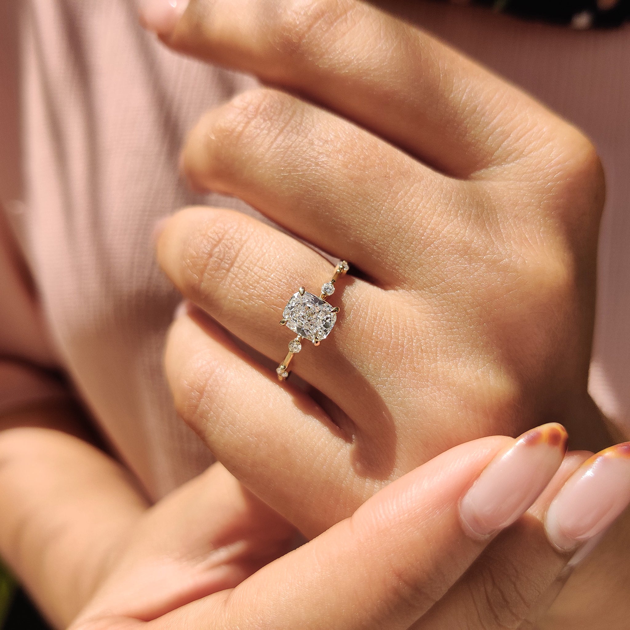 Elegant distance pave setting ring with round cut side stones, showcasing Lab Grown Diamonds.
