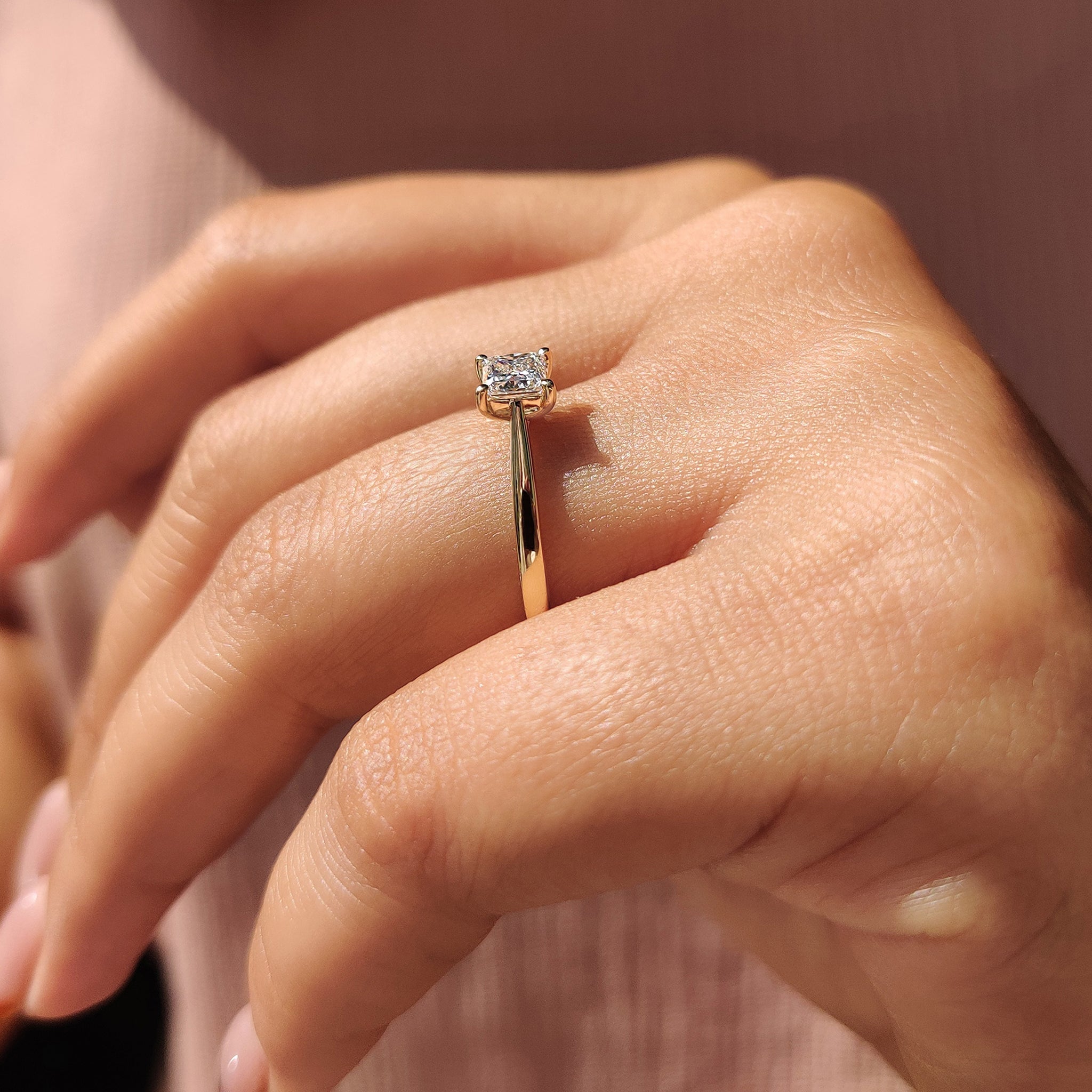 Yellow gold princess cut solitaire diamond ring, featuring an IGI certified lab-grown diamond.
