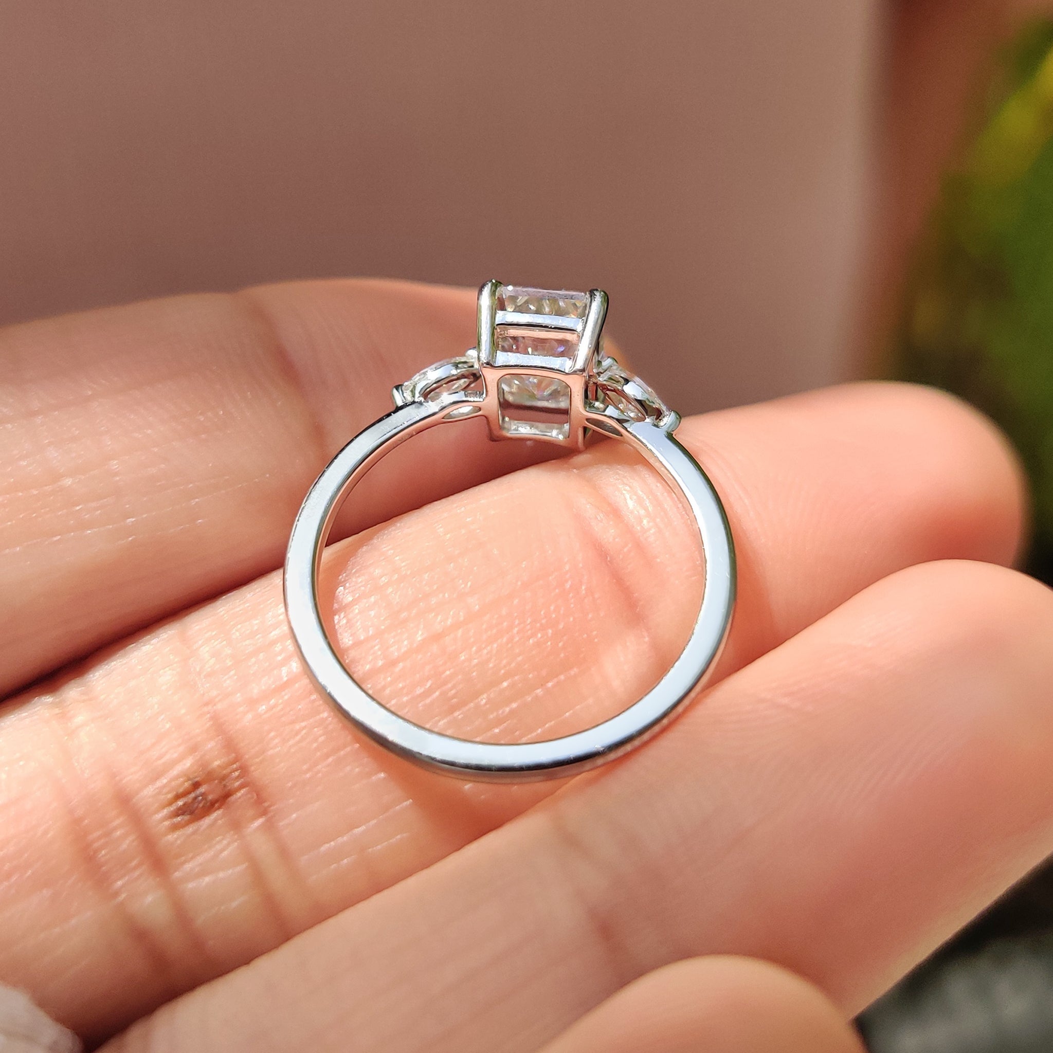 Radiant Cut Diamond Engagement Ring featuring marquise side stones and 4 prong setting.
