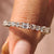 Emerald Diamond featured in a semi eternity wedding band.