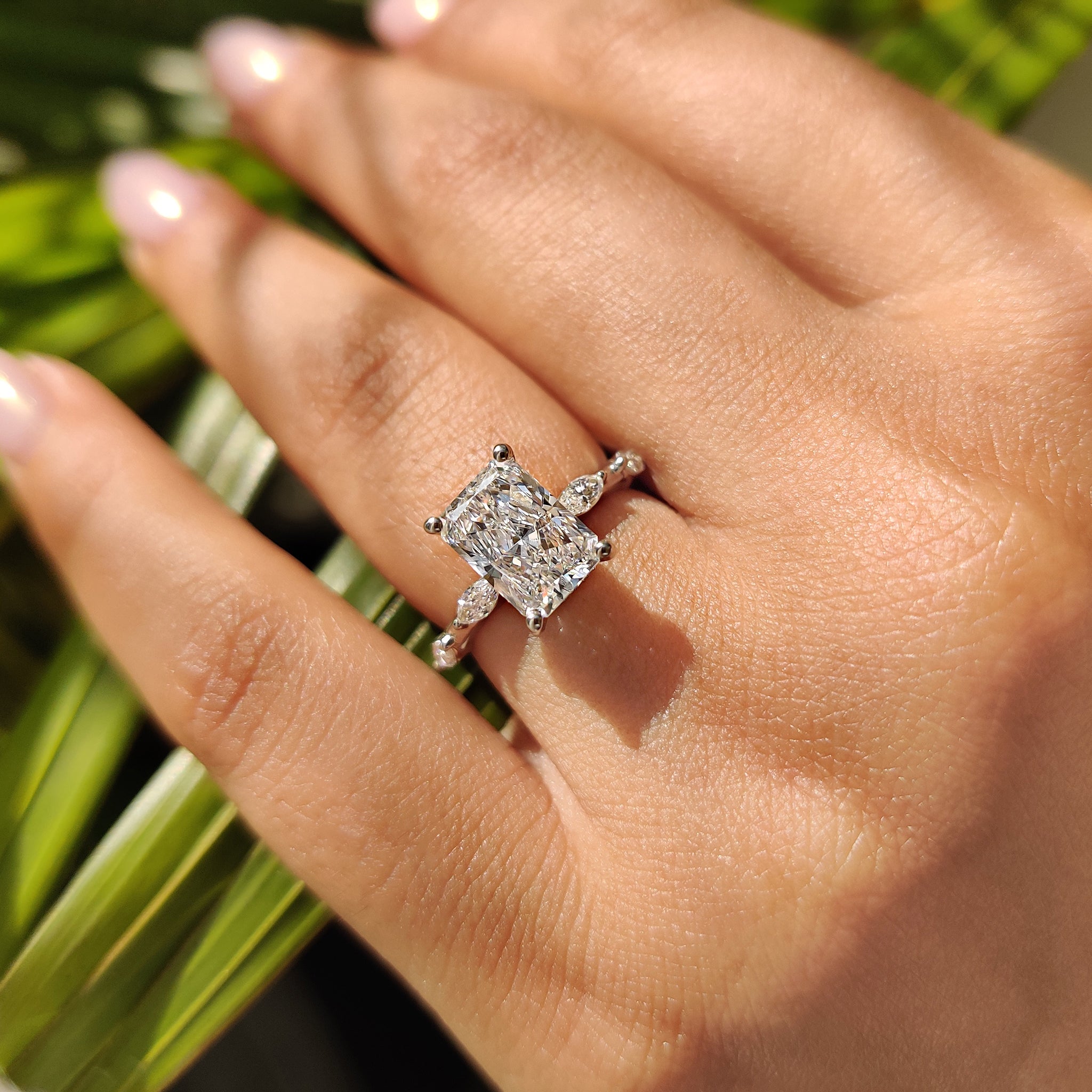 Radiant cut engagement ring set in white gold, featuring IGI certified Lab Grown Diamonds.
