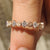 Nature Inspired Wedding Band featuring intricate floral details and elegant design.