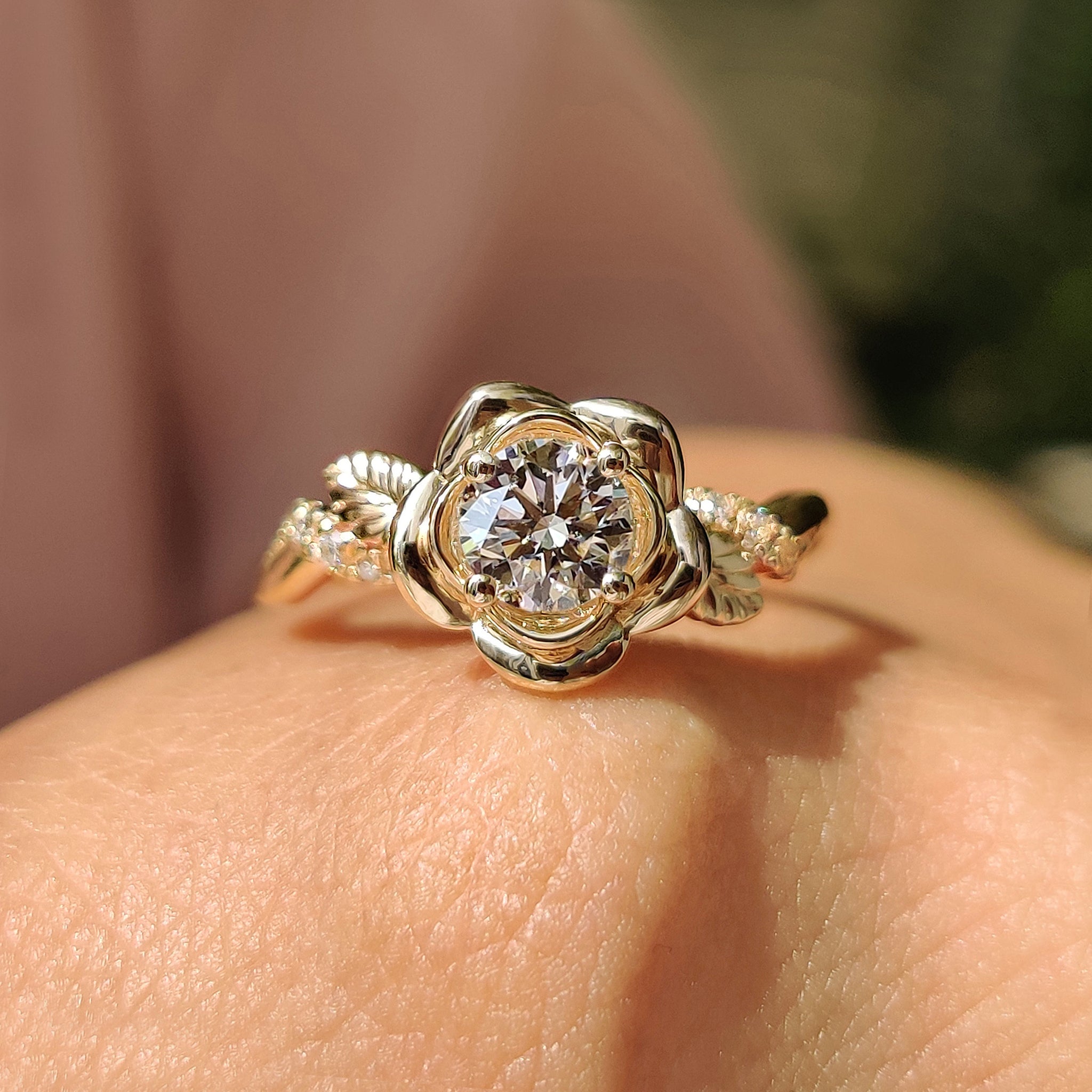 Yellow gold engagement ring with round diamond.