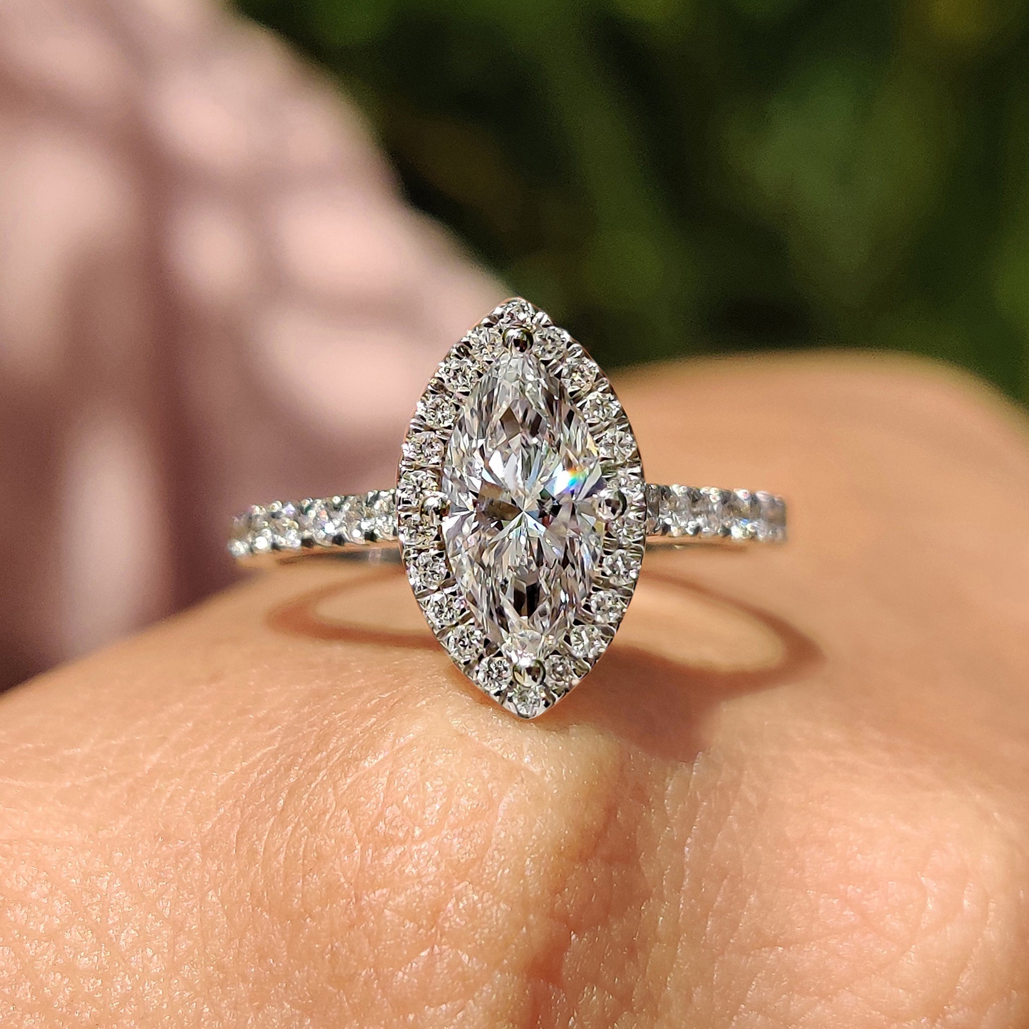 Buy engagement ring with compass prong setting.
