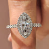Marquise diamond ring with white gold band.
