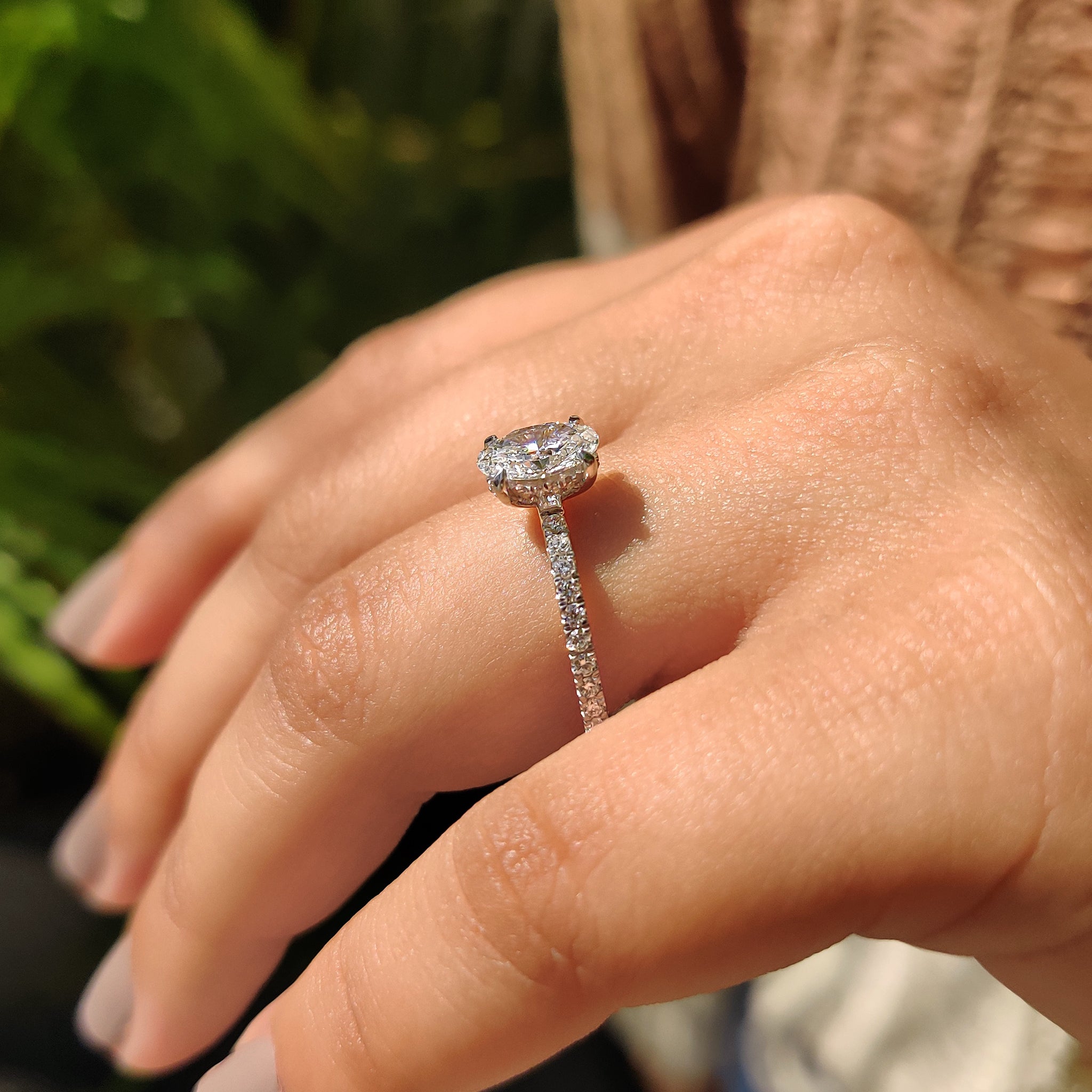 Pave setting engagement ring with lab grown diamond.