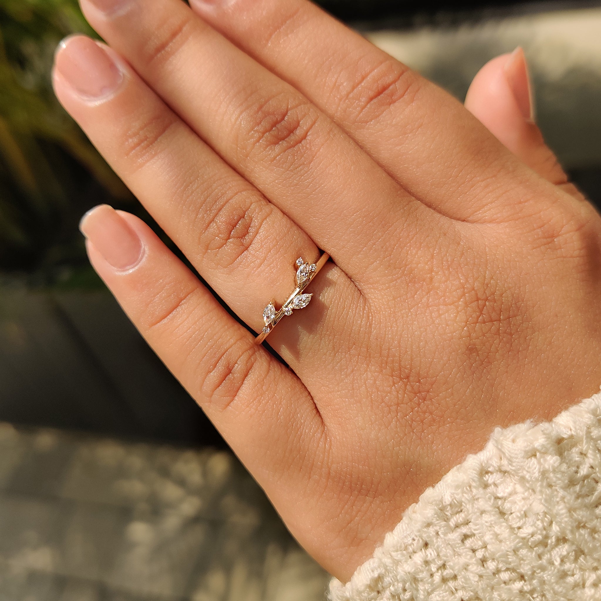 Carat diamonds wedding band with marquise and round diamond cluster design.