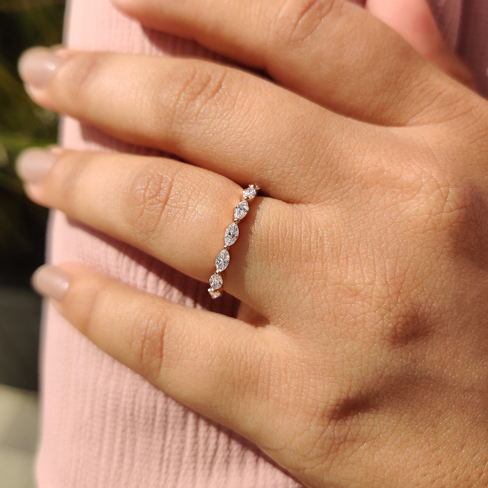Rose gold wedding band with full eternity marquise diamond for special occasions.

