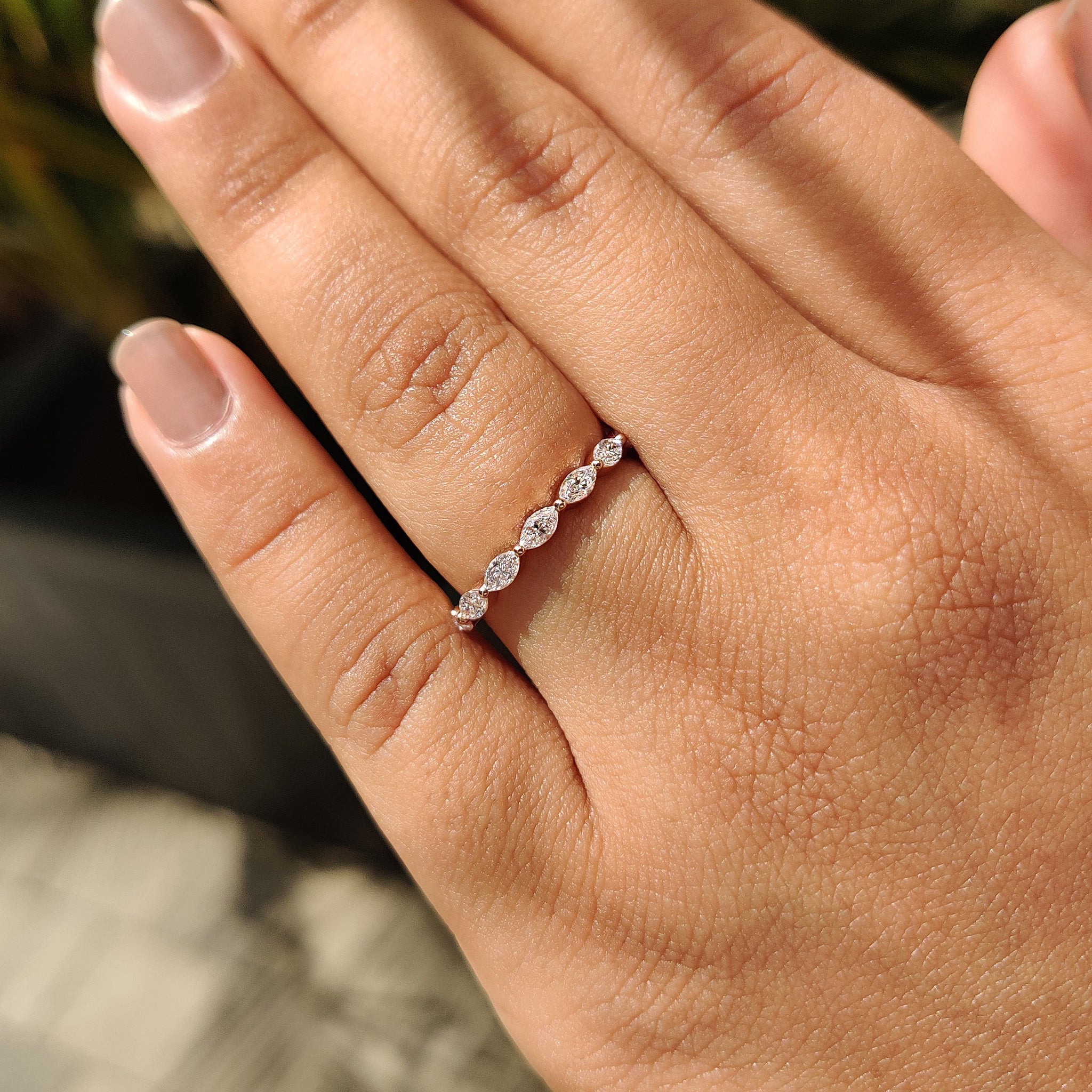 Handmade jewelry custom wedding band with simple diamond and marquise style.
