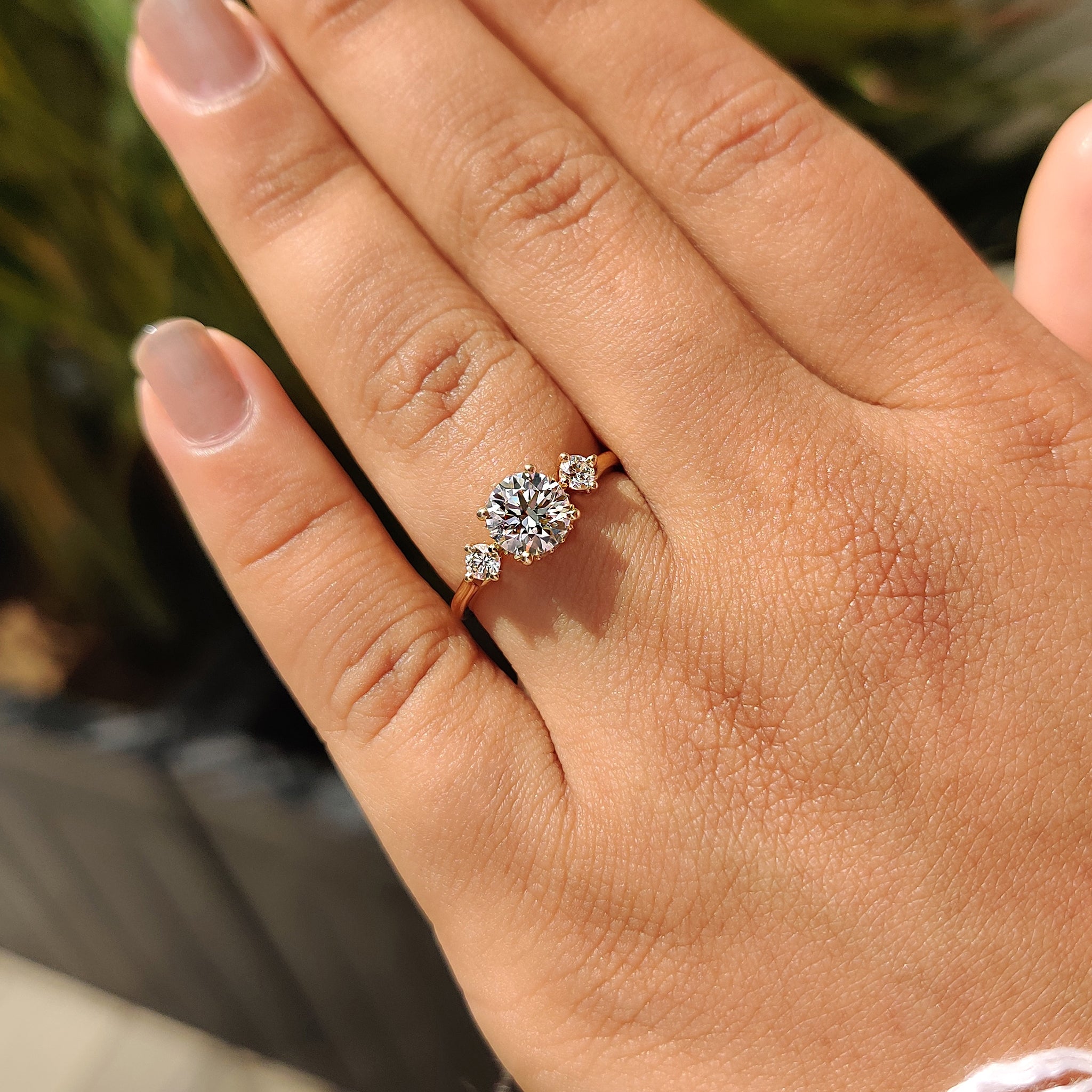 Buy diamond engagement ring with hidden halo and yellow gold finish.