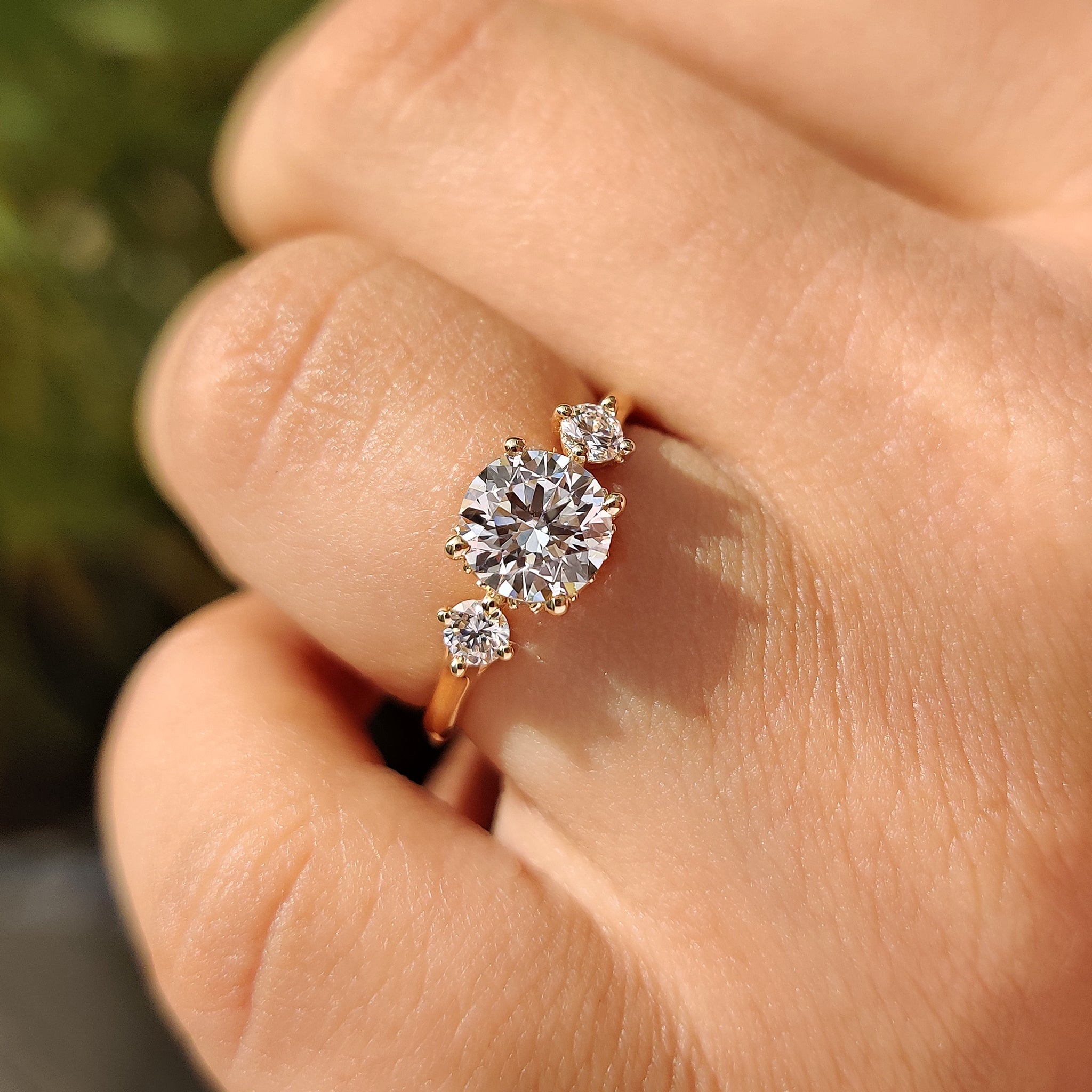 Round diamond center stone featured in carat diamonds engagement ring.
