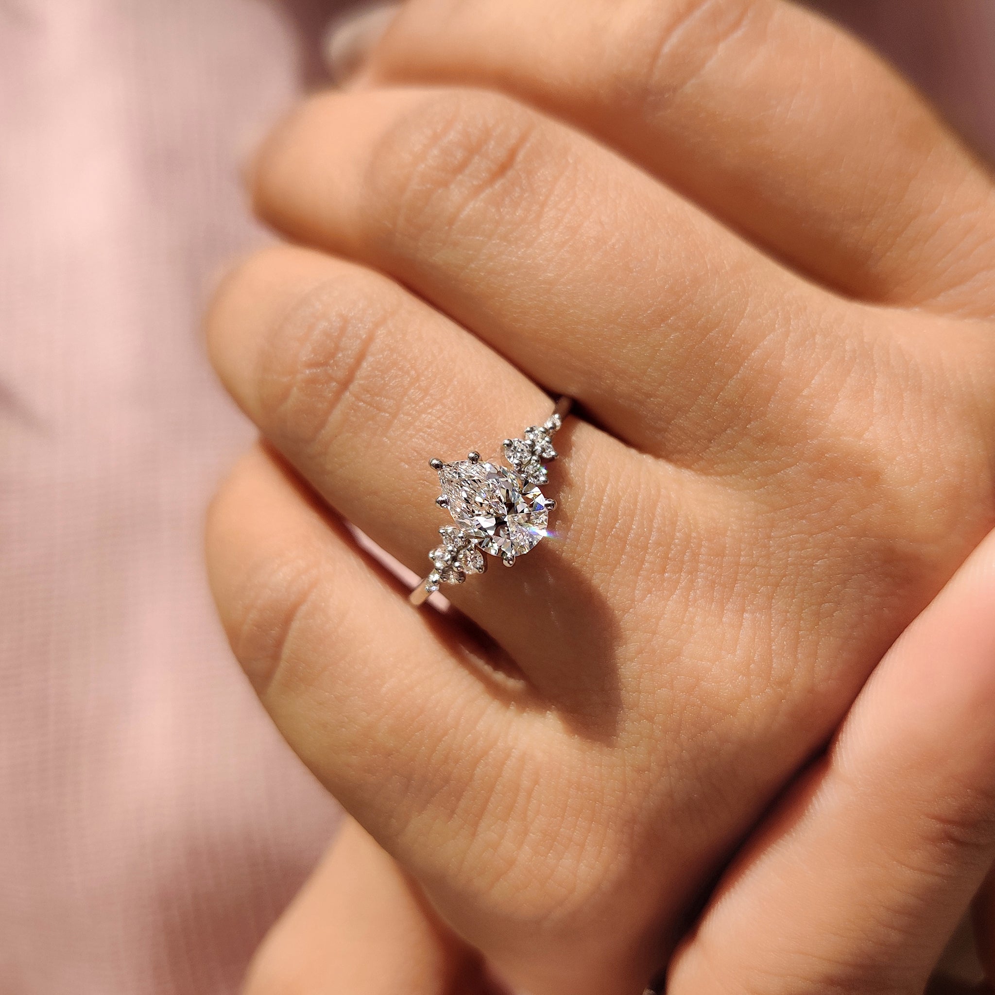 Pear Shaped Diamond Ring - Side Stone