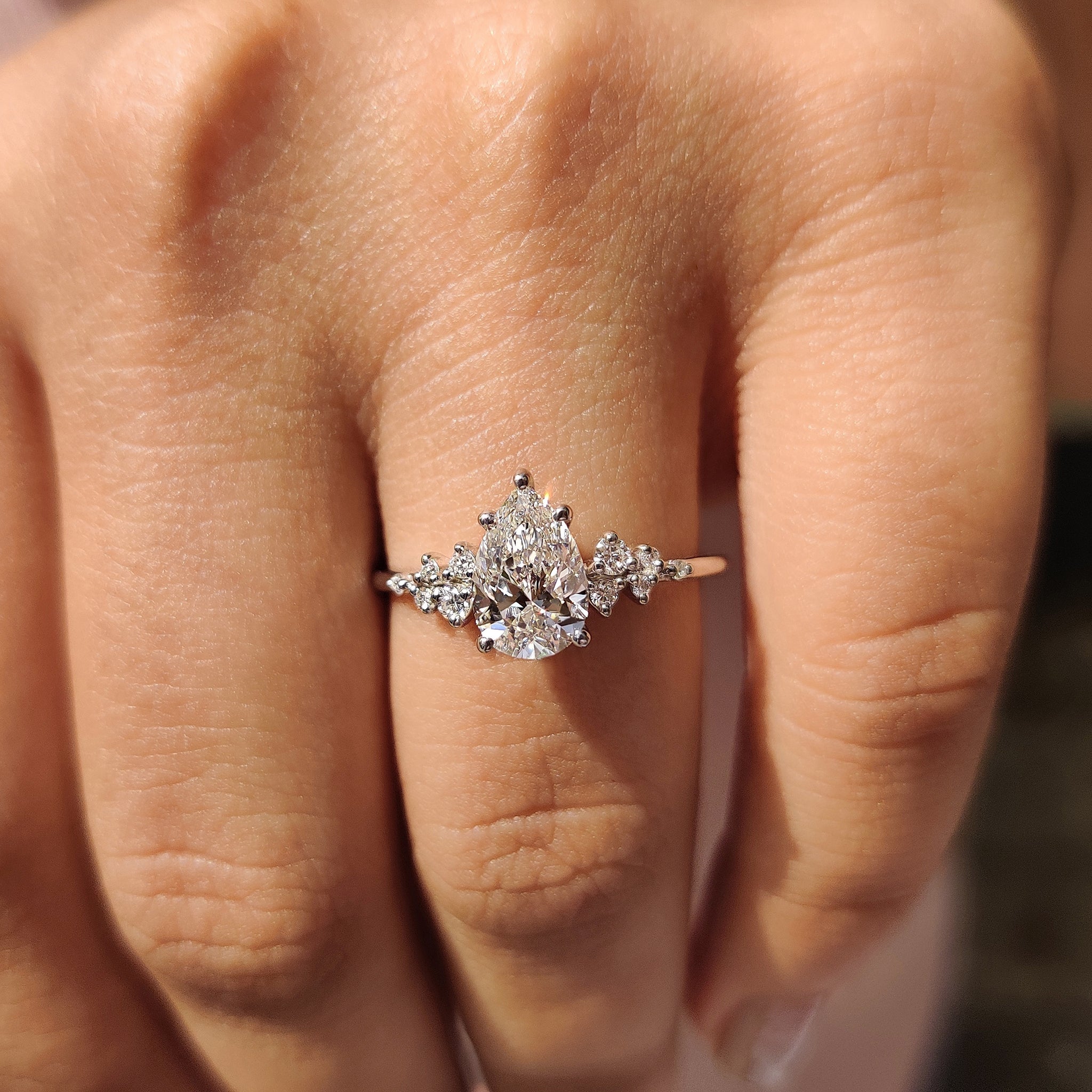 Pear Shaped Diamond Ring - Side Stone