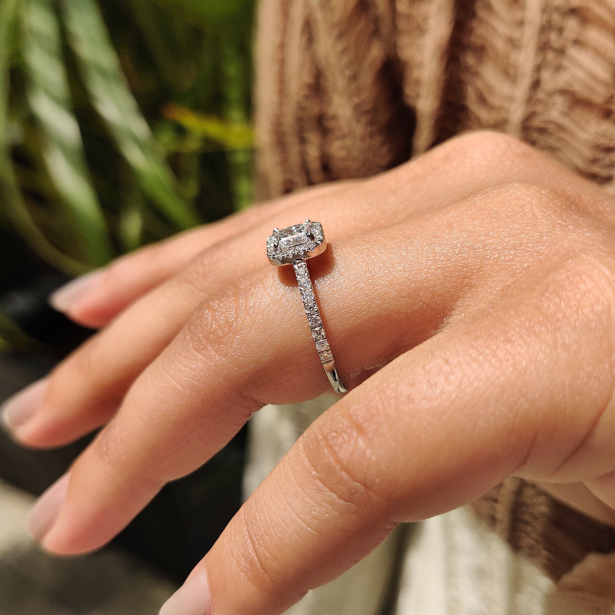 Handmade jewelry princess cut diamond ring with halo setting.
