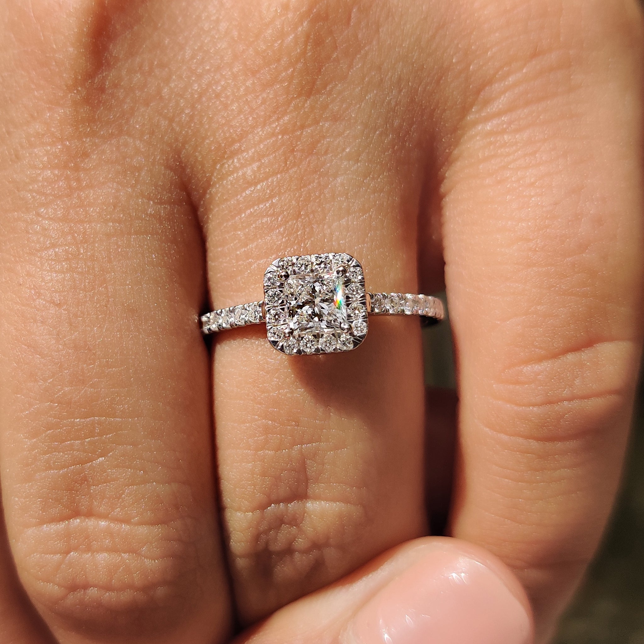Lab grown diamond princess cut ring with custom halo design.
