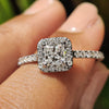 Halo princess cut engagement ring with princess cut diamond center.
