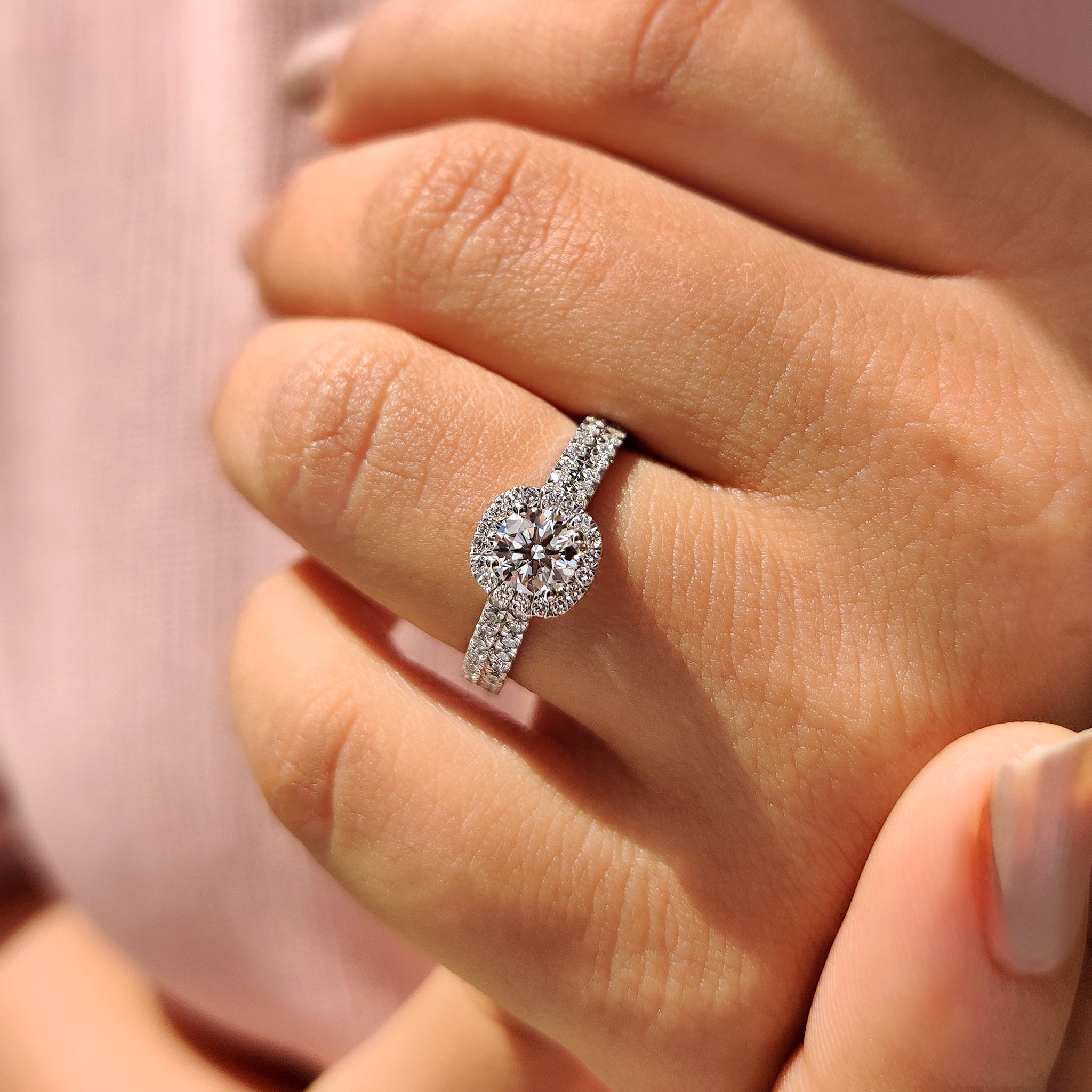 Handmade jewelry with carat diamonds engagement ring.

