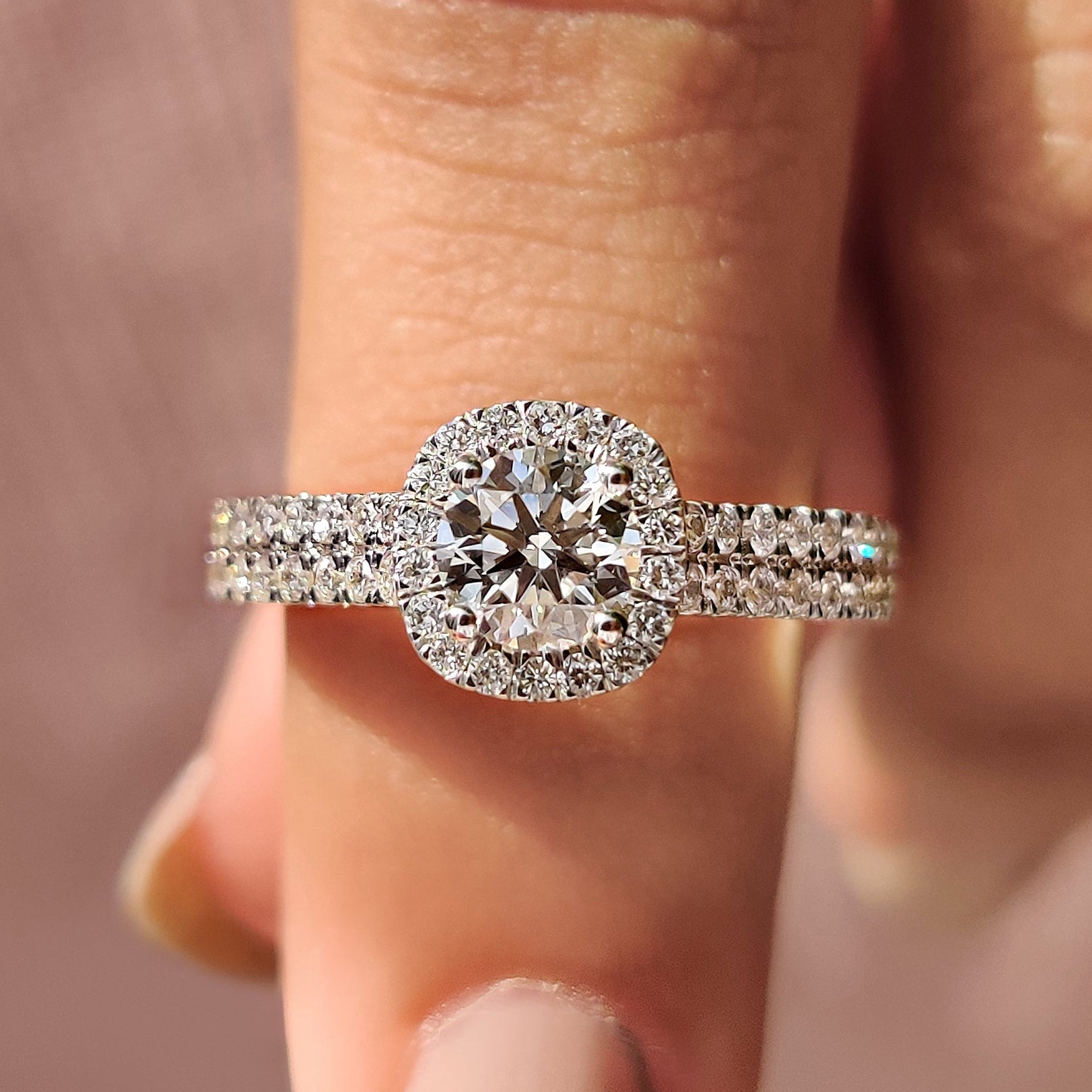 Round cut engagement ring with halo setting ring.

