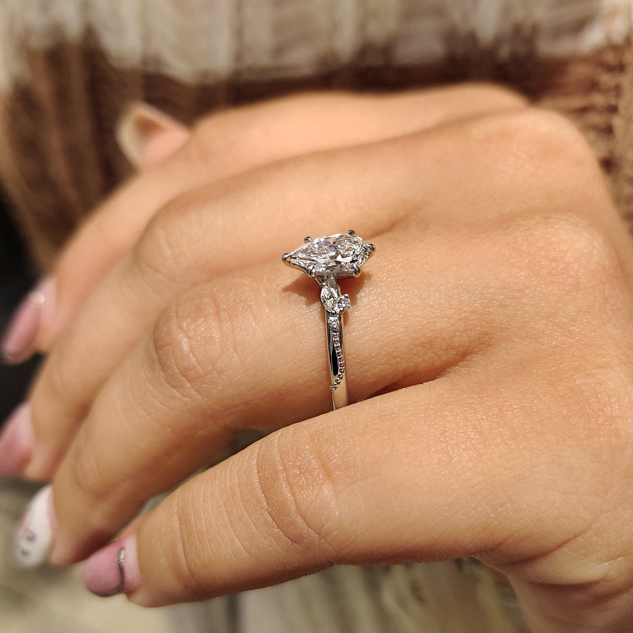 IGI certified paired with cluster diamond ring.
