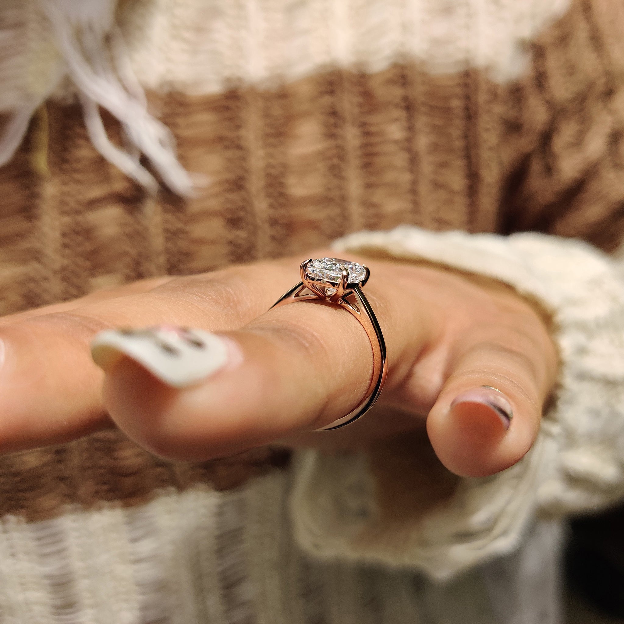 Rose gold engagement ring with Lab Grown Diamond.
