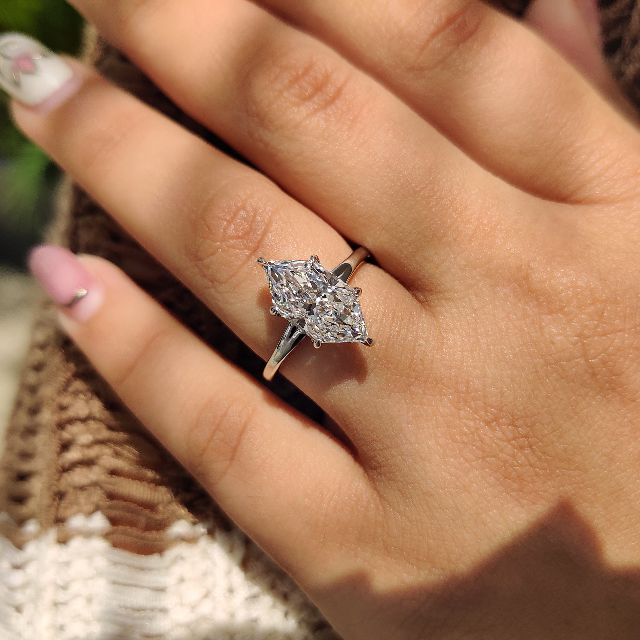 Dutch marquise engagement ring with tapered shank ring.
