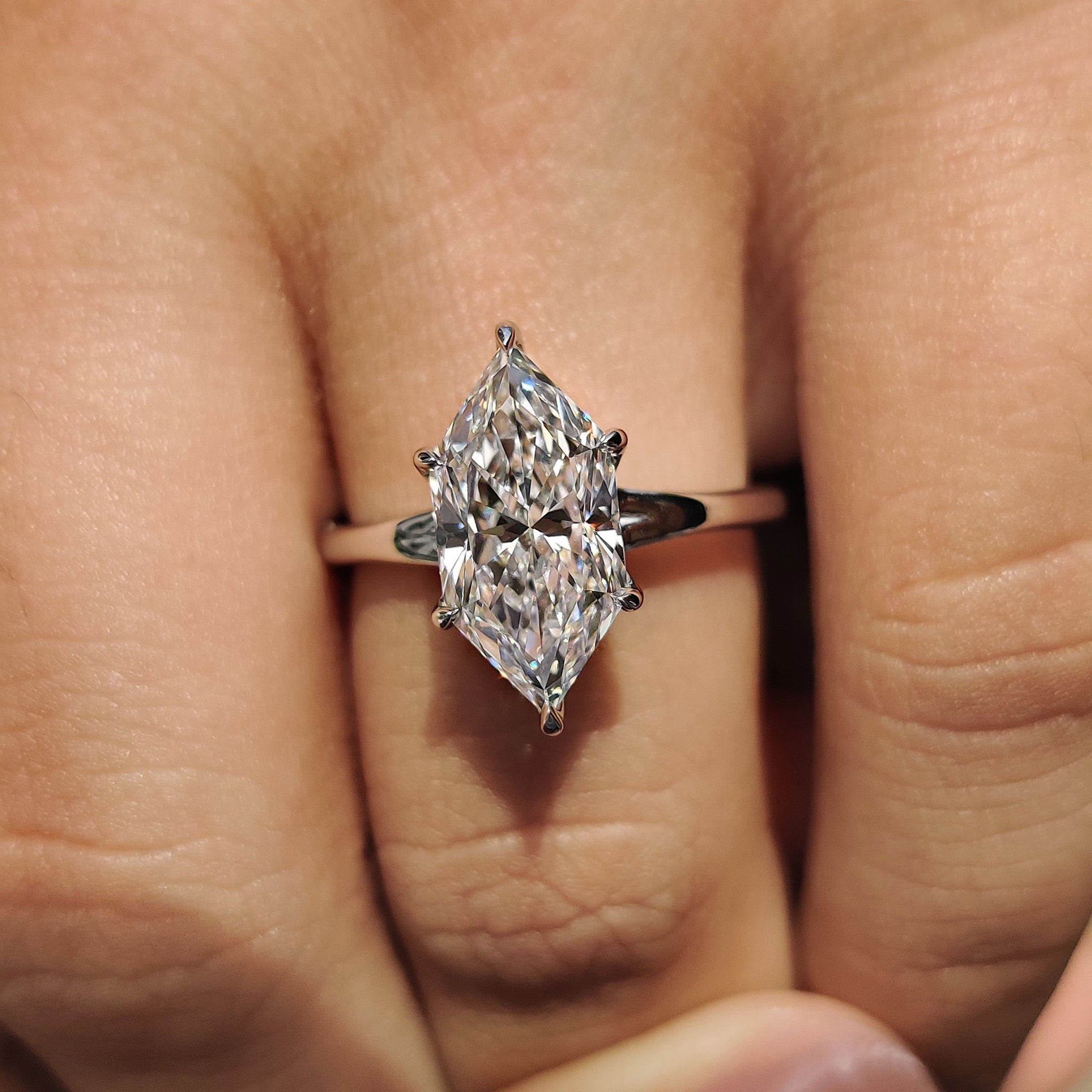 Carat diamonds engagement ring with dutch marquise style.
