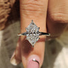 Dutch marquise engagement ring with solitaire engagement ring.
