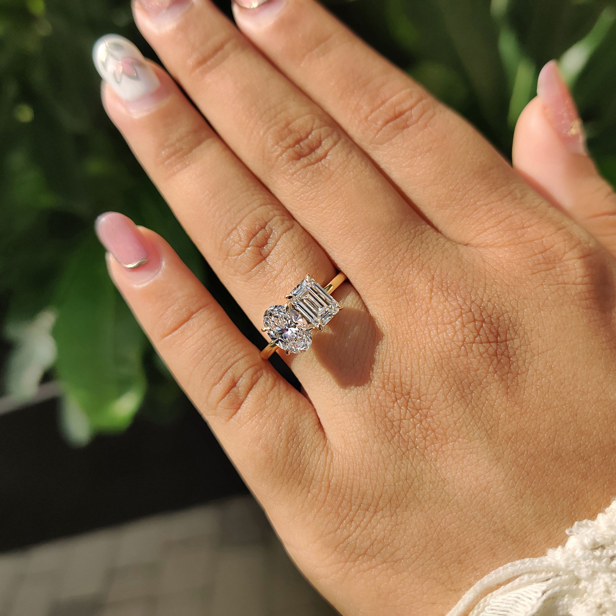 Carat diamonds engagement ring with emerald cut design.
