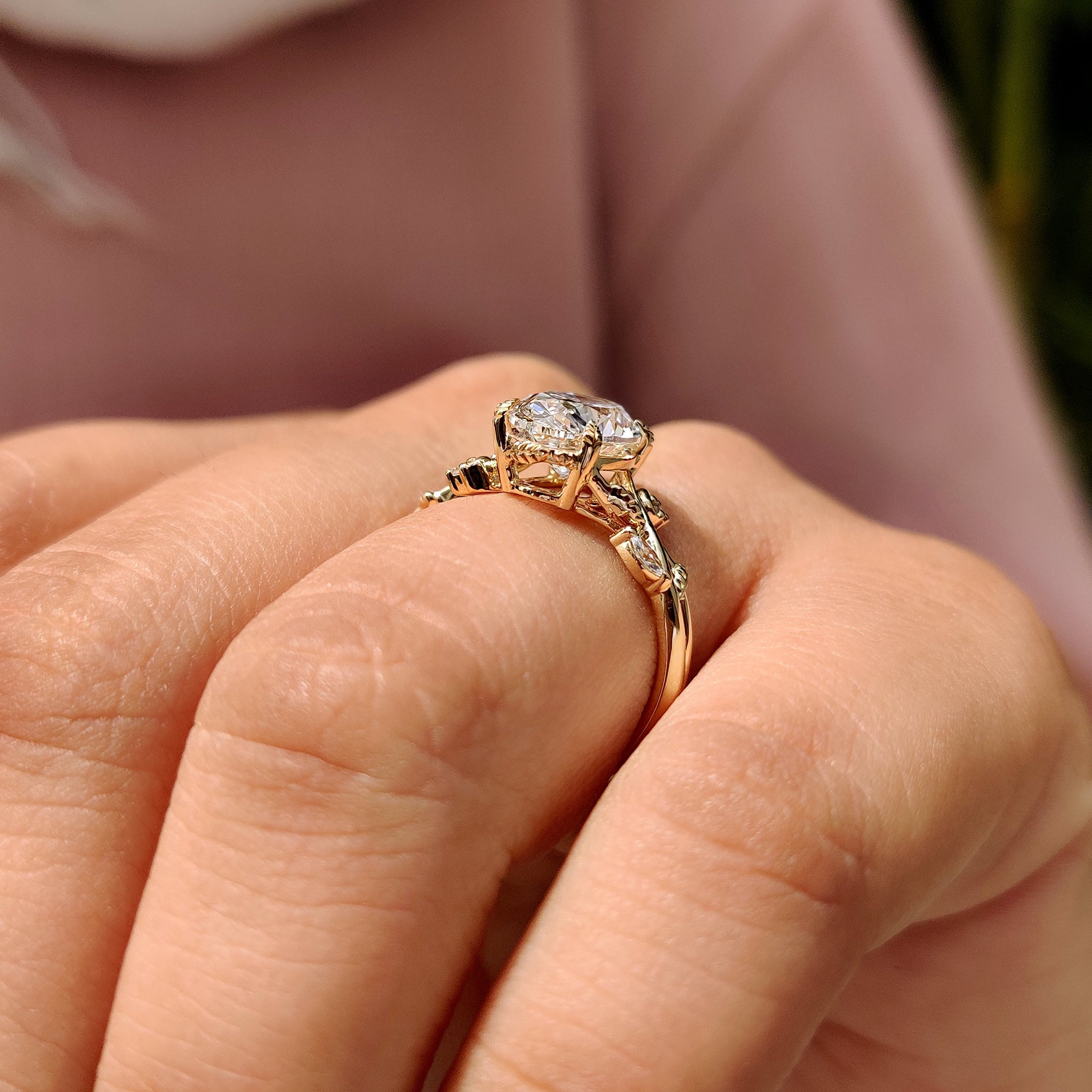 Nature inspired engagement ring with twisted shank band.
