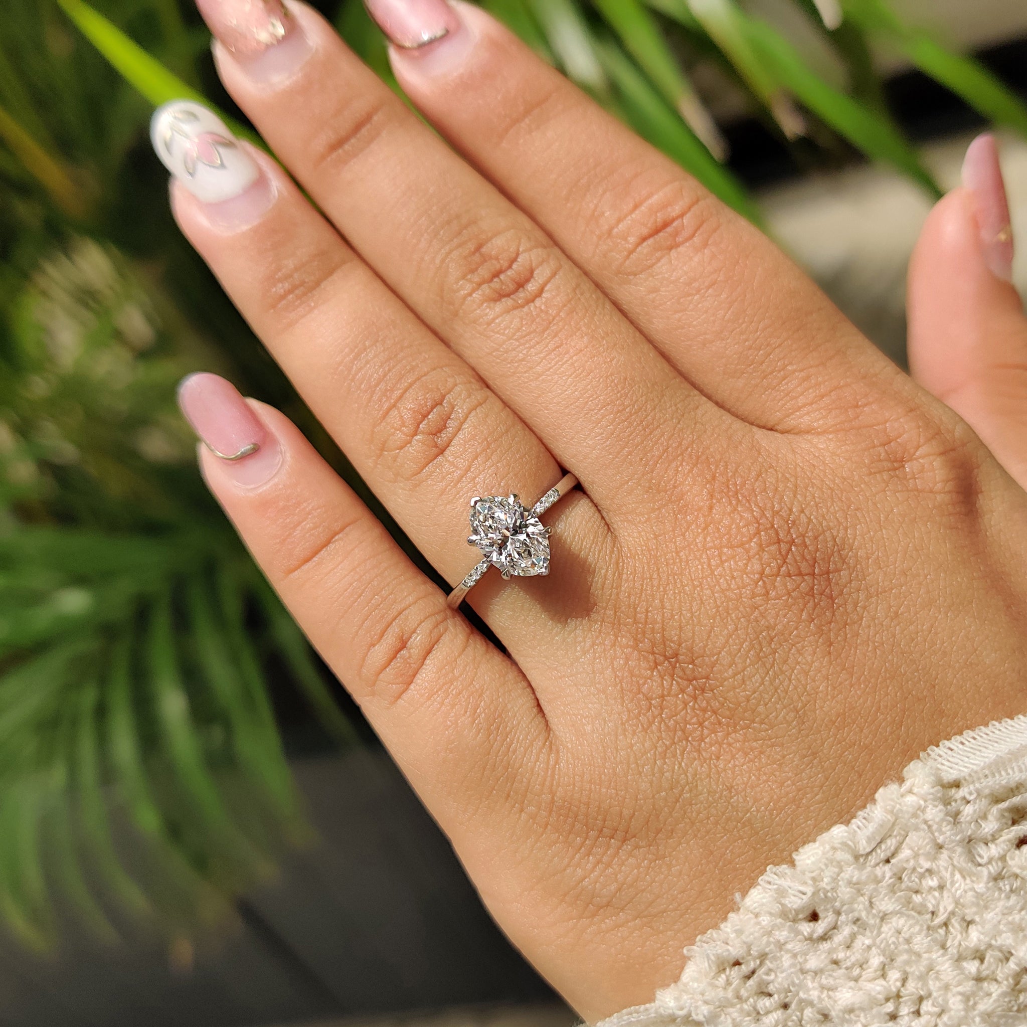 Carat diamonds engagement ring with oval cut style.