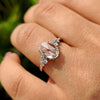 Oval rose cut engagement ring with cluster diamond ring.
