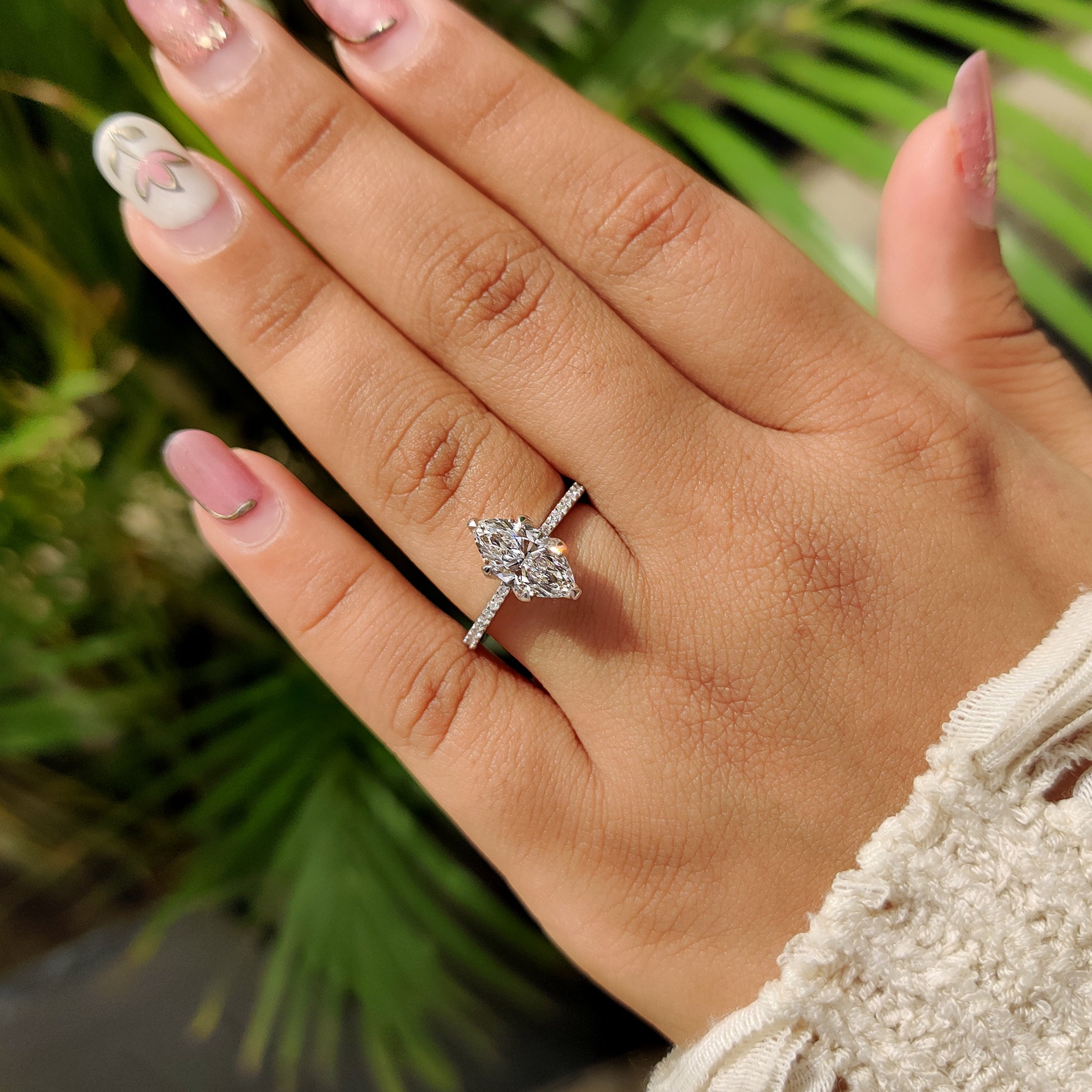 Cathedral set engagement ring with white gold band.