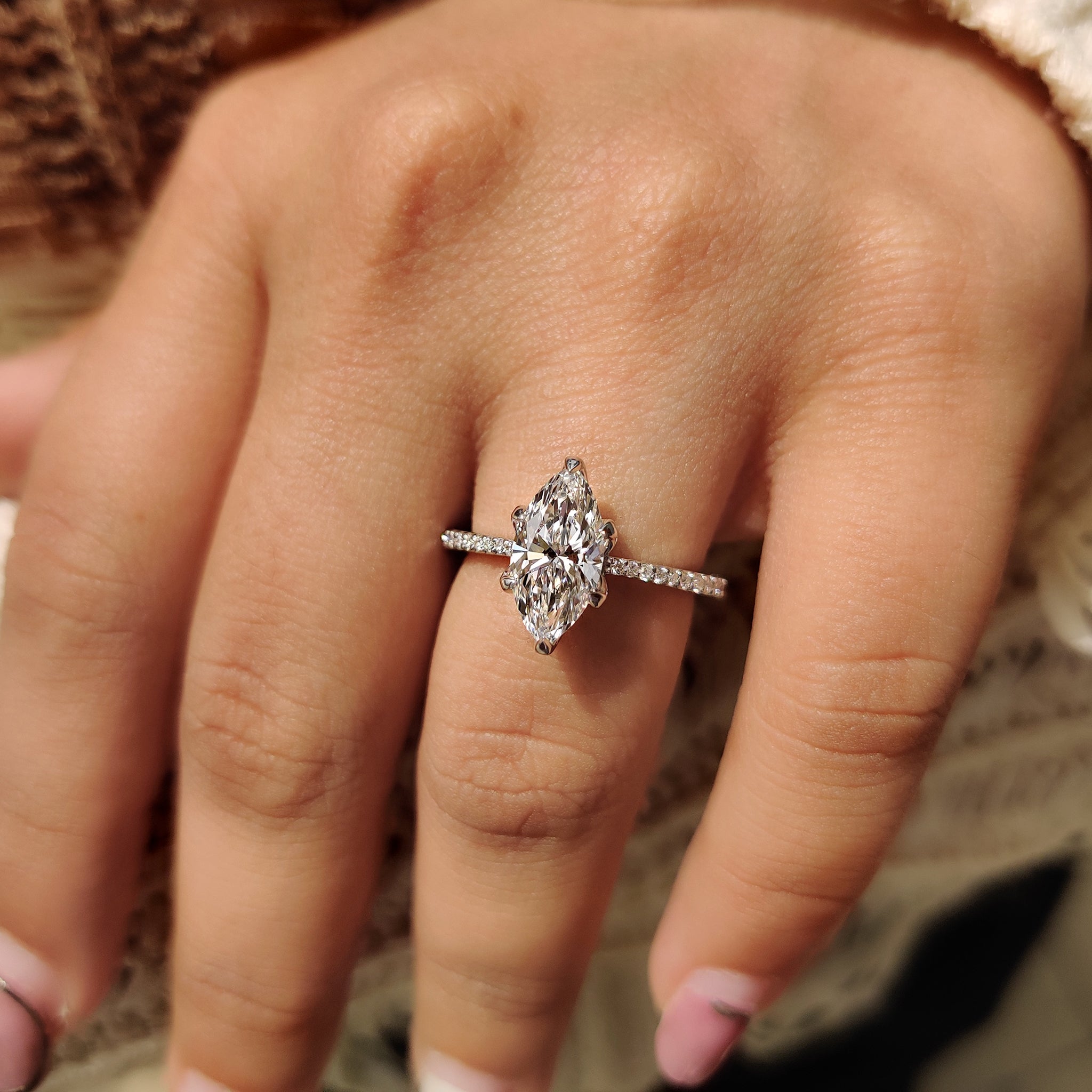 Tapered shank ring with six claw prong setting.
