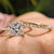 Princess cut engagement ring and wedding band with hidden halo ring.

