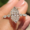 Dutch marquise engagement ring with marquise and round pave set.